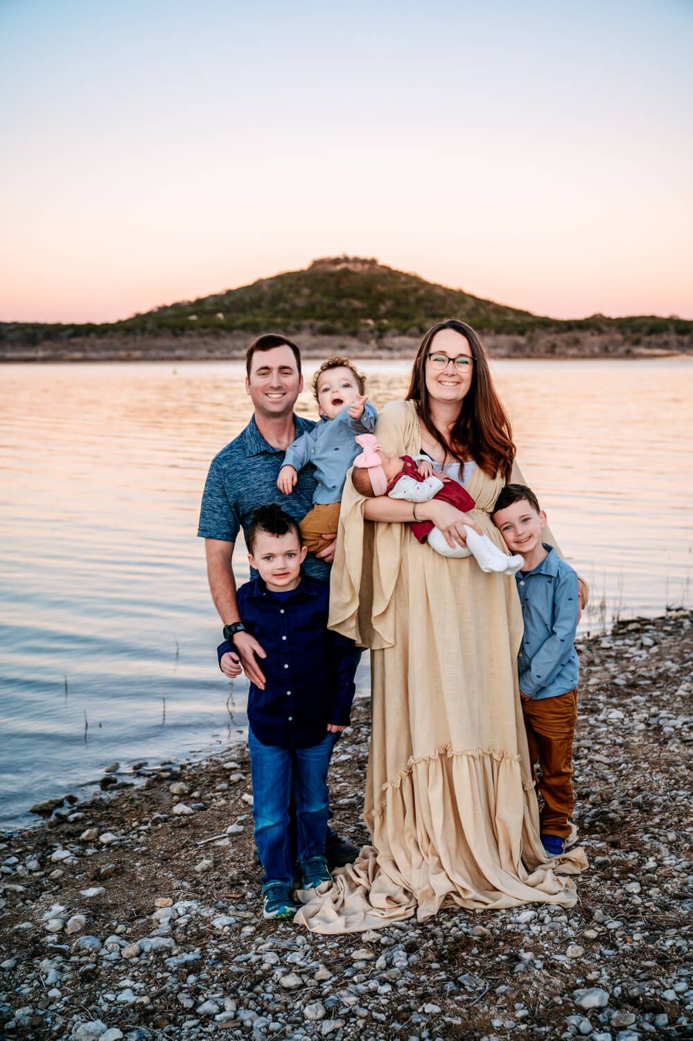 Central Texas lifestyle outdoor family newborn photography at sunset