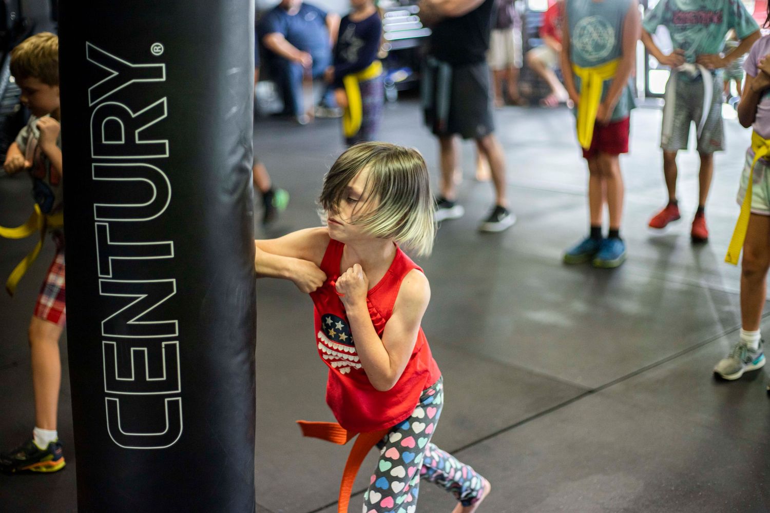 Children practicing safe self-defense drills