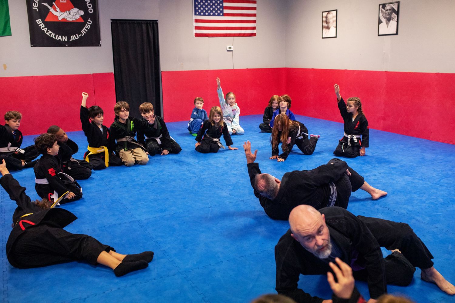 Martial arts instructor teaching kids focus and discipline