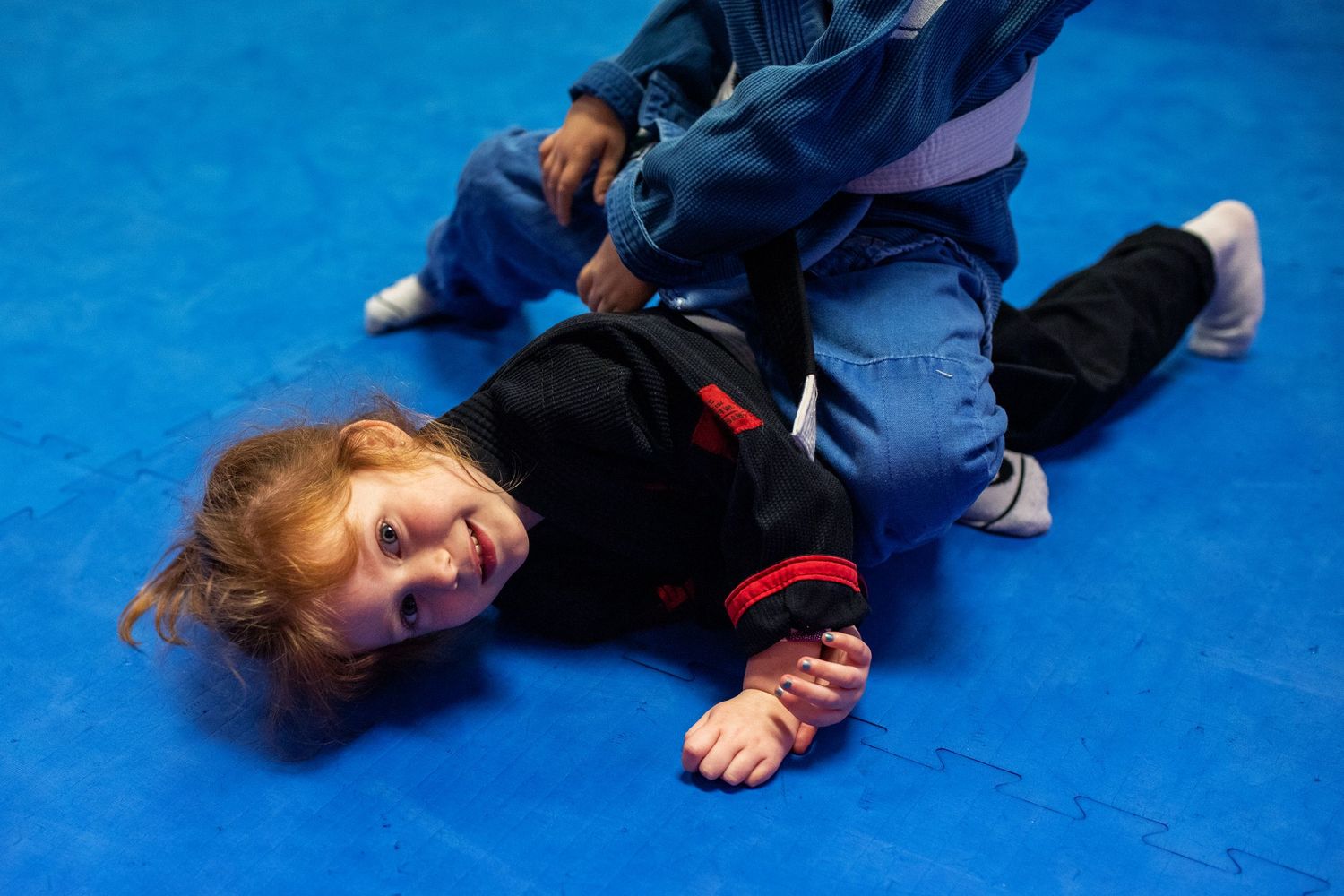 Youth BJJ training session at martial arts academy