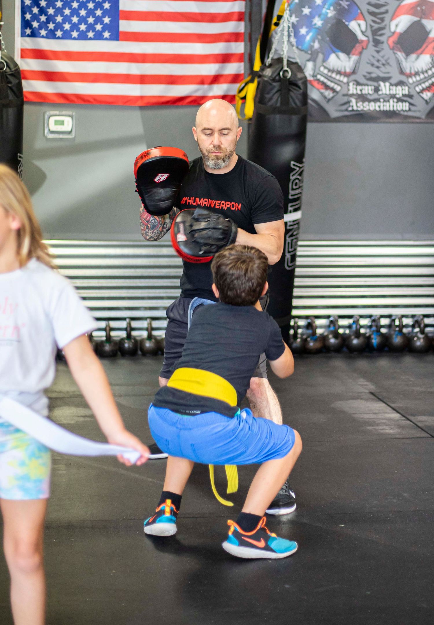 Children practicing safe self-defense drills