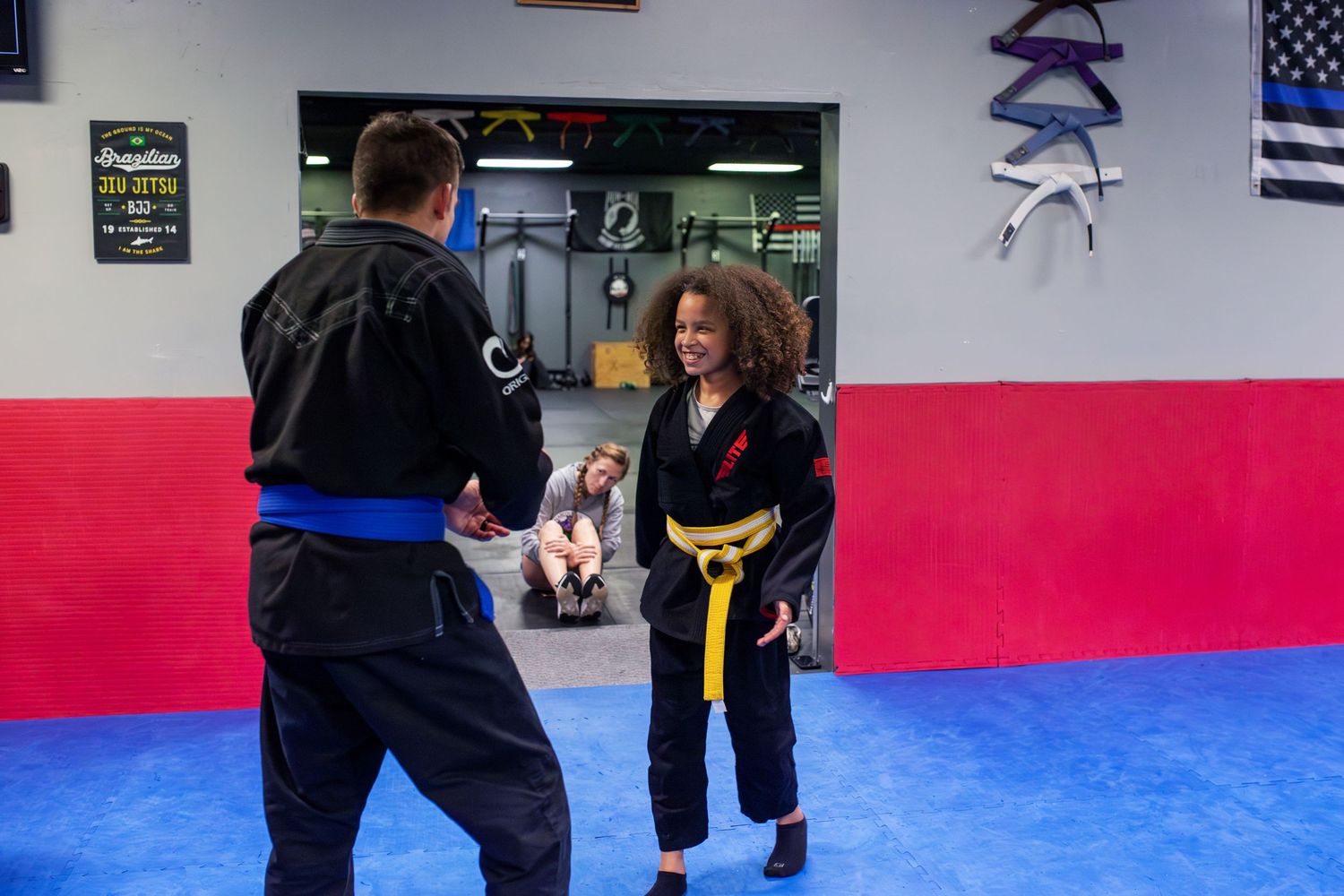 Martial arts instructor teaching kids focus and discipline