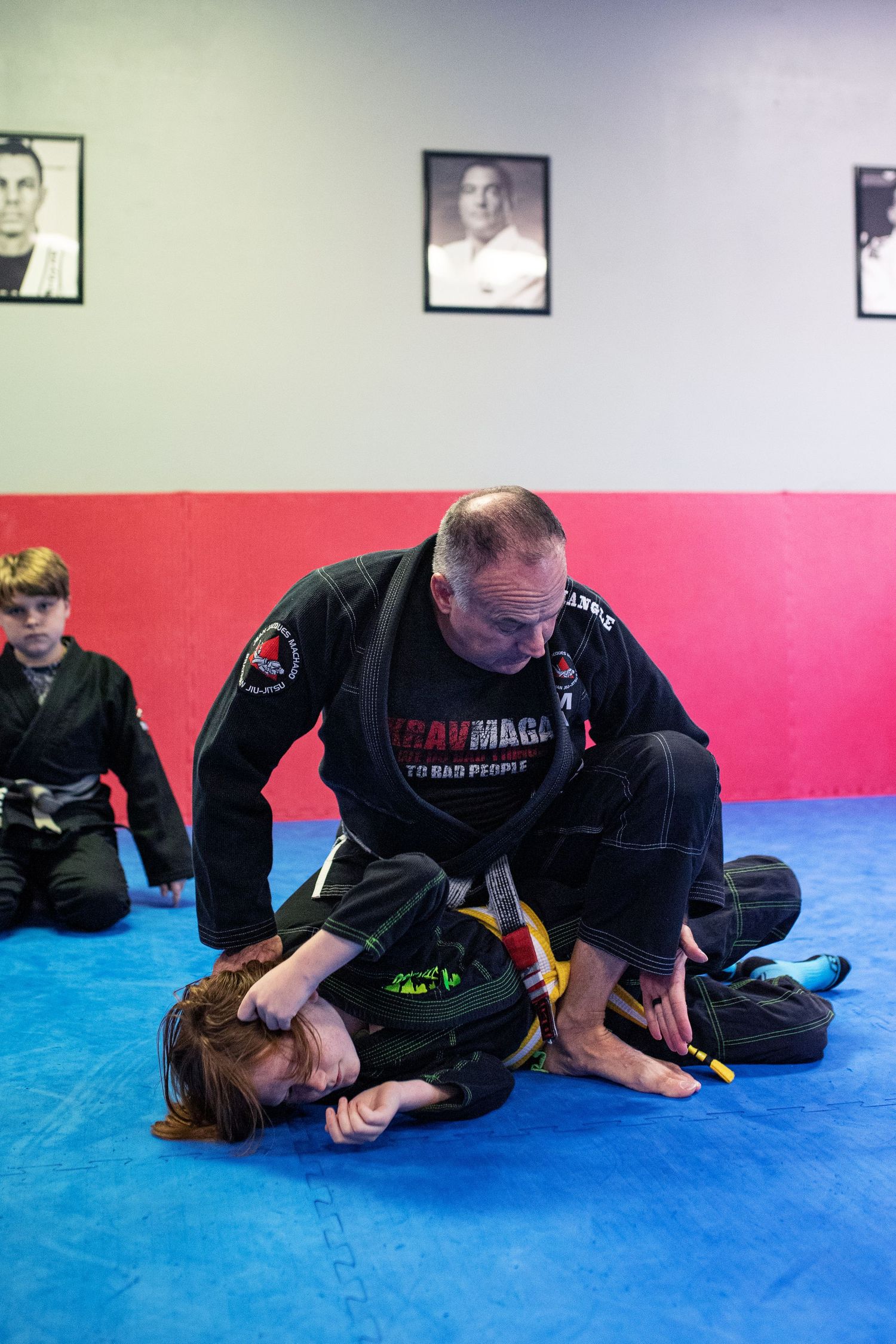 Martial arts instructor teaching kids focus and discipline