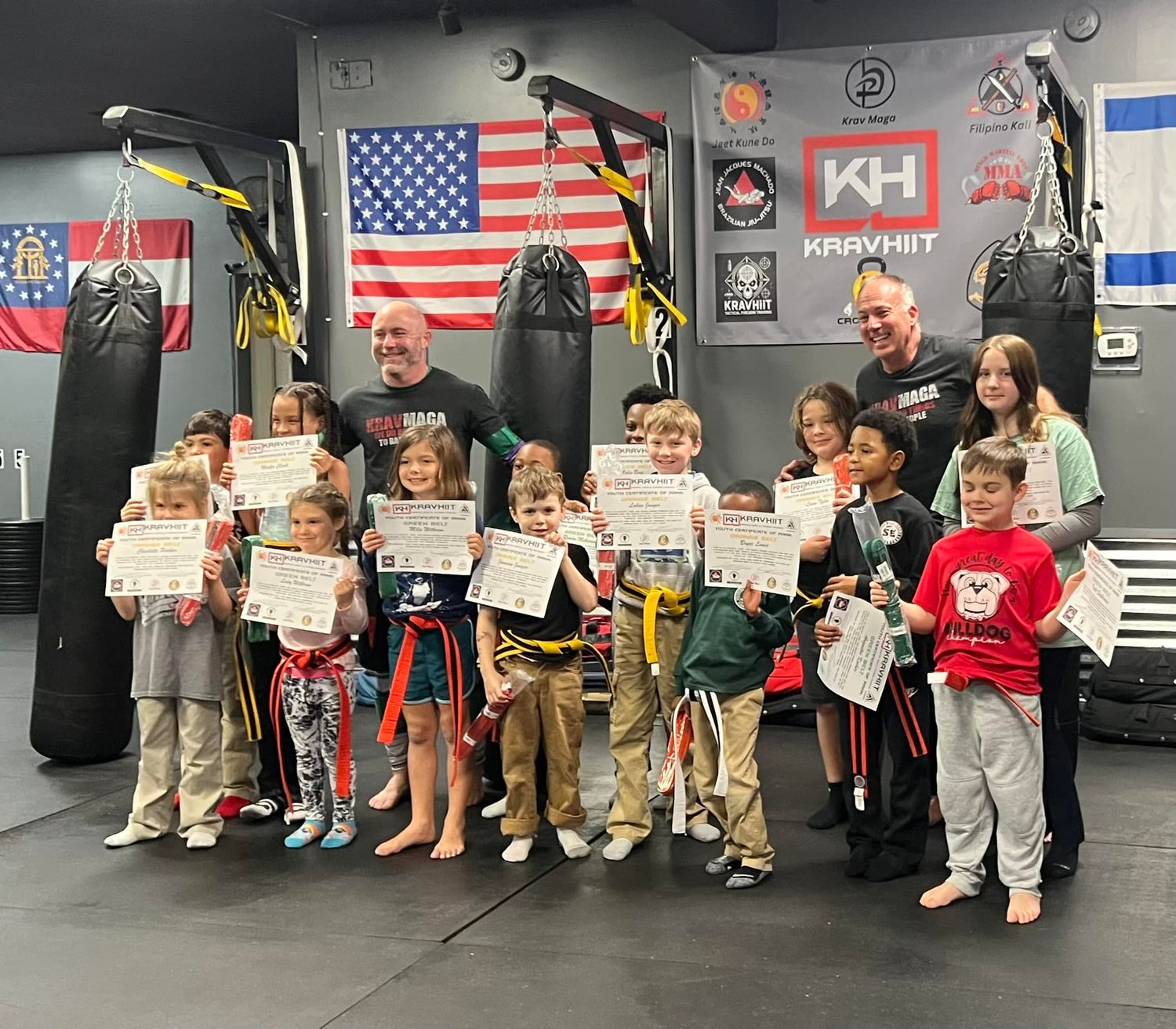 Martial arts students after class at family-friendly Krav Maga academy