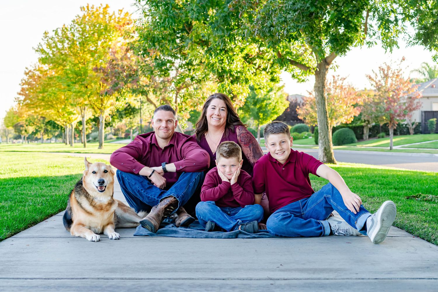 Turlock family photographer, Rachel Chamberlain, taking lifestyle family portraits at golden hour with kids running and playing.
