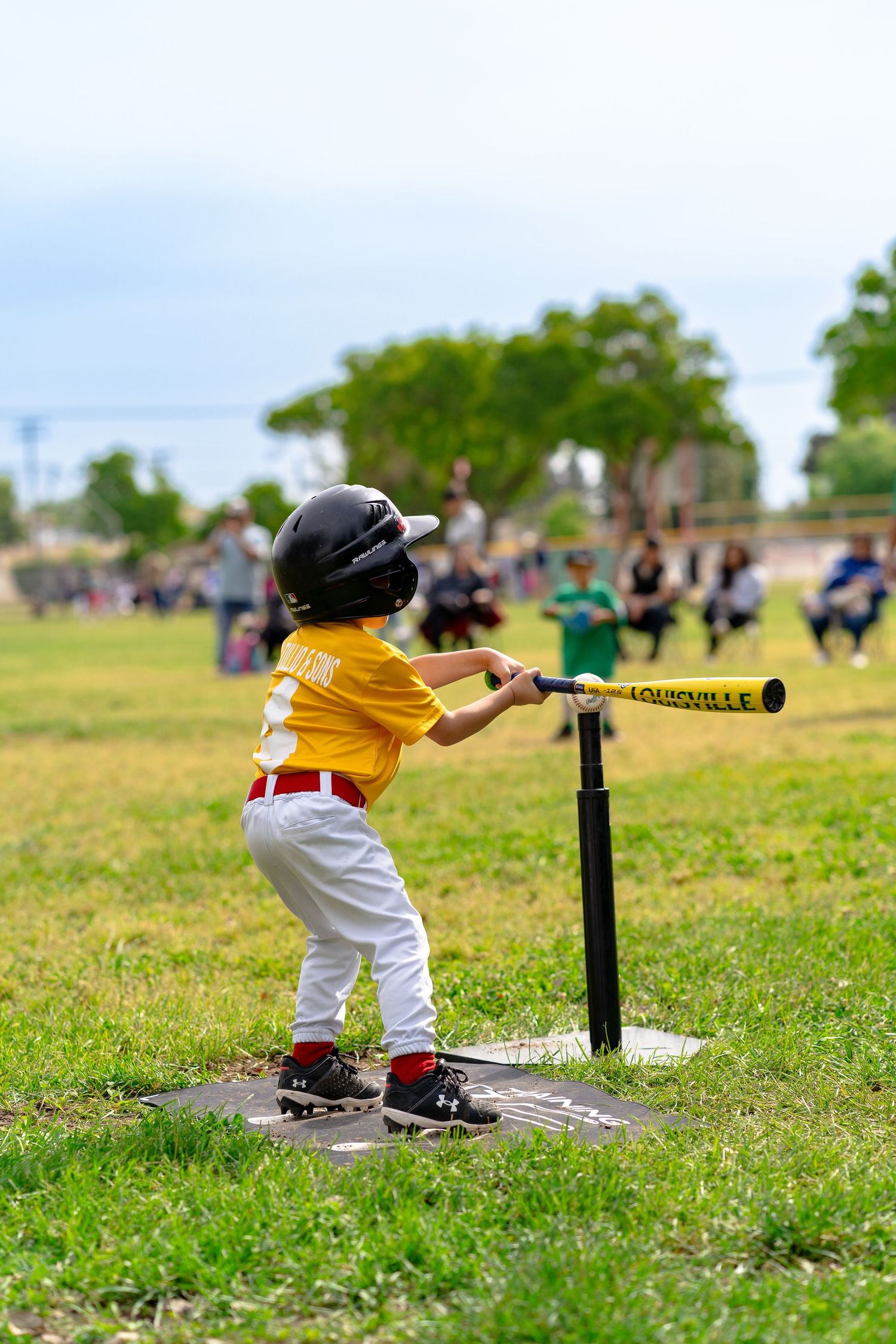 Turlock tball player swinging during a game in California's Central Valley.