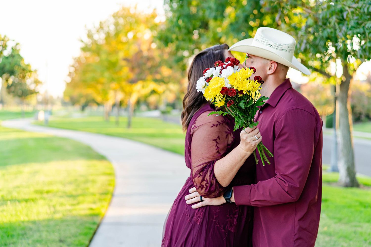 Turlock family photographer, Rachel Chamberlain, taking lifestyle couples portraits at sunset.