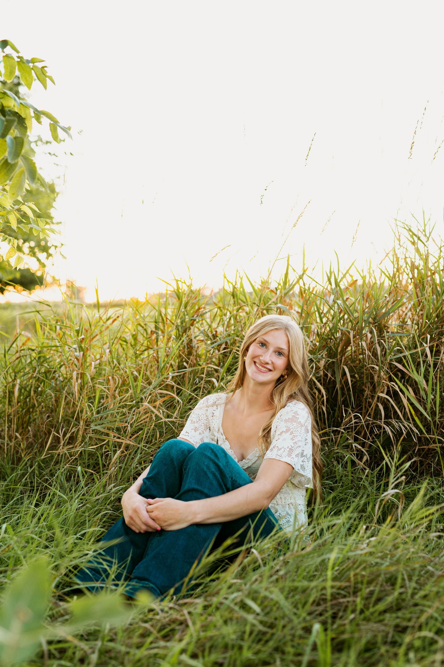 A series of joyful moments captured in tall grass during golden hour at sunset.