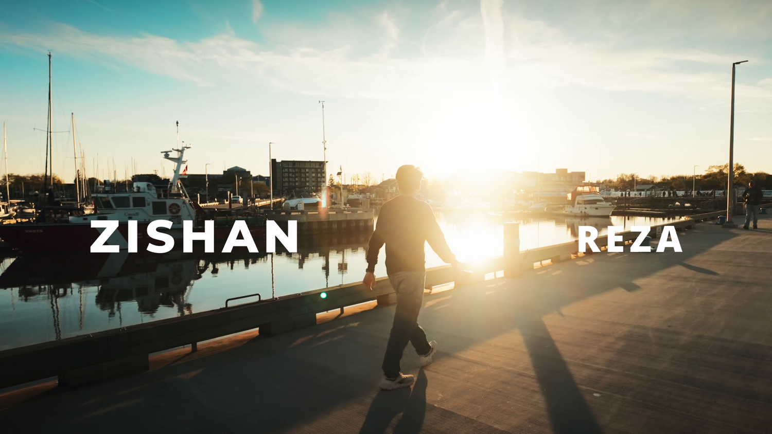 Silhouette of a person walking at sunset near a marina with text overlay.