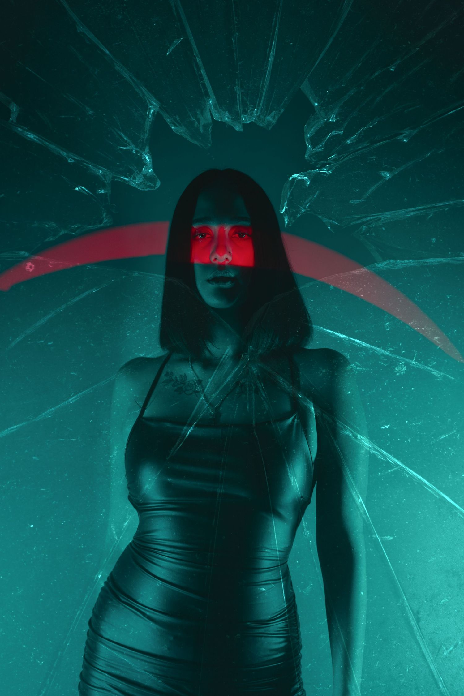 Cyberpunk style portrait with neon red lighting against turquoise cracked background.