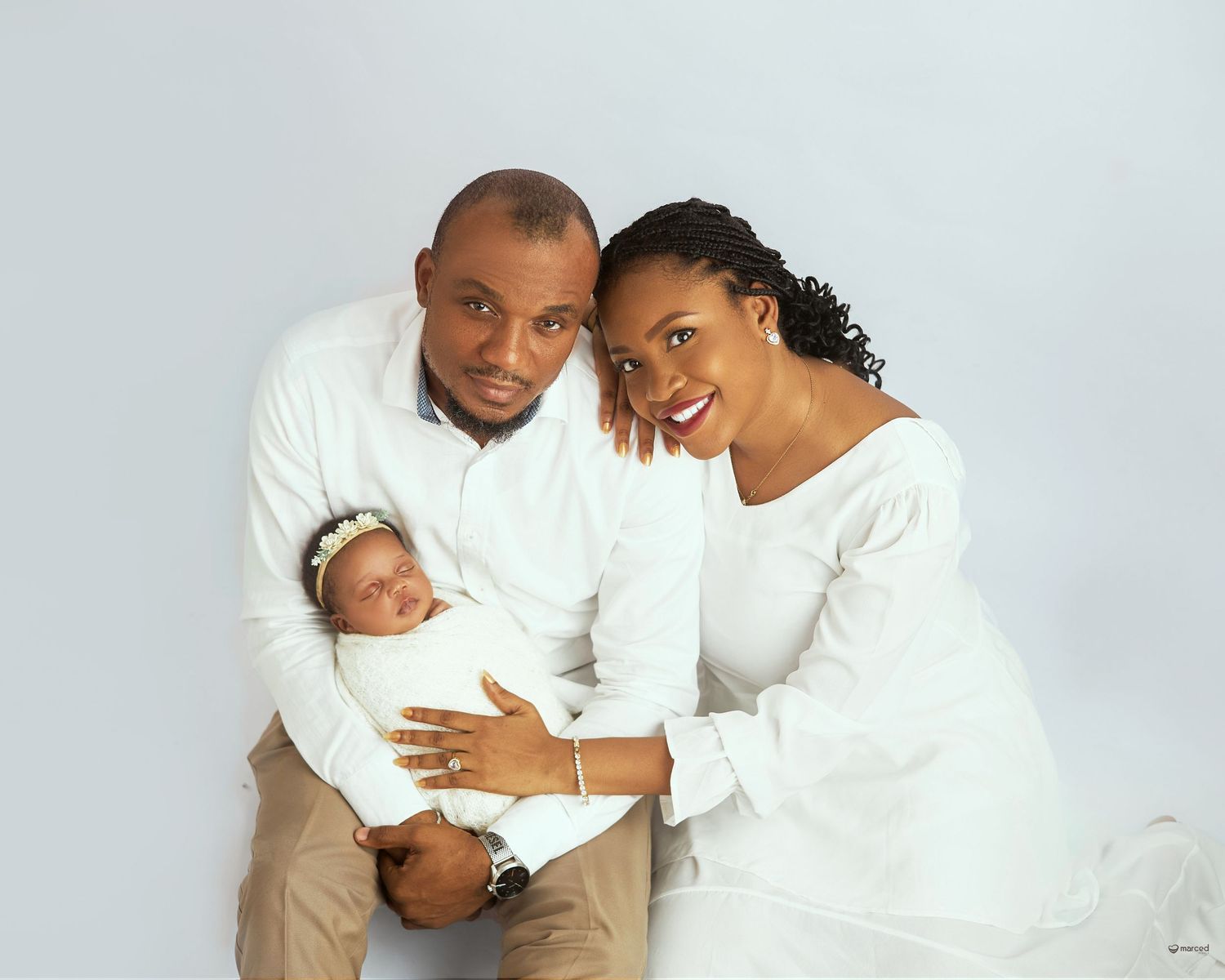family photoshoot with newborn baby, white theme family portrait inspo