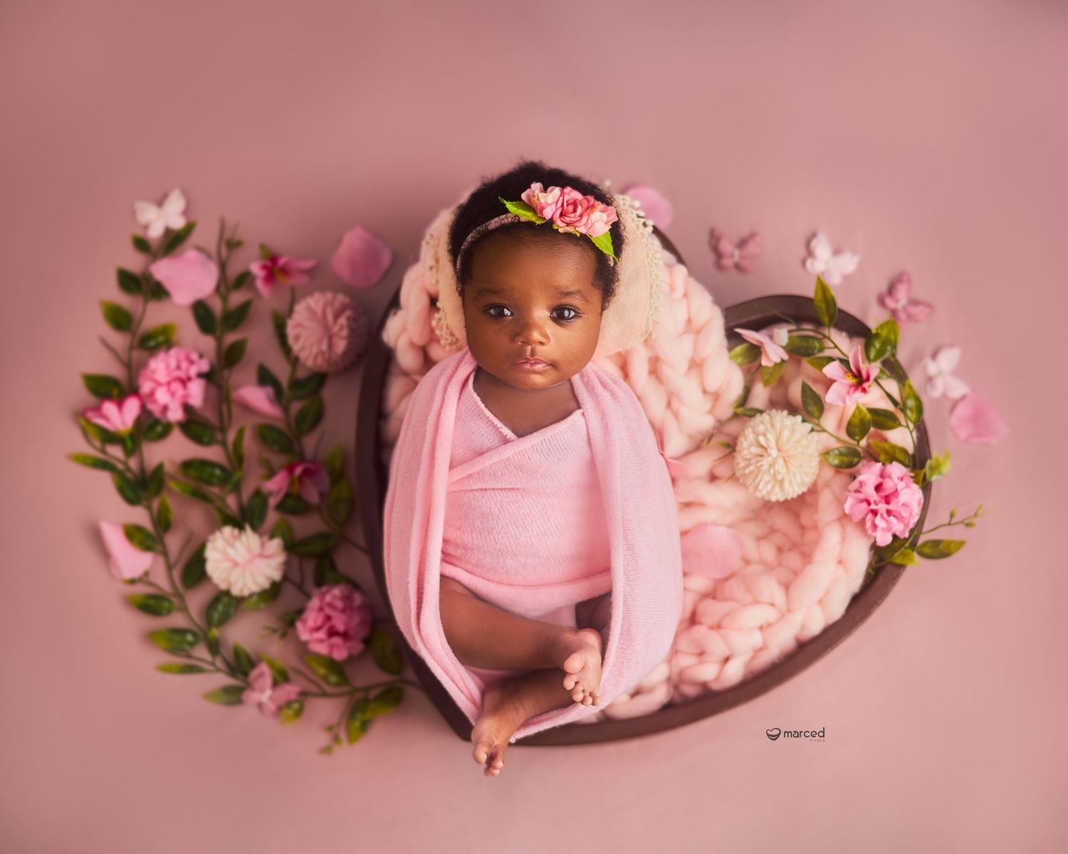 one month milestone photoshoot newborn photos girl pink bed photography cute poses three months poses pearls tutu skirt