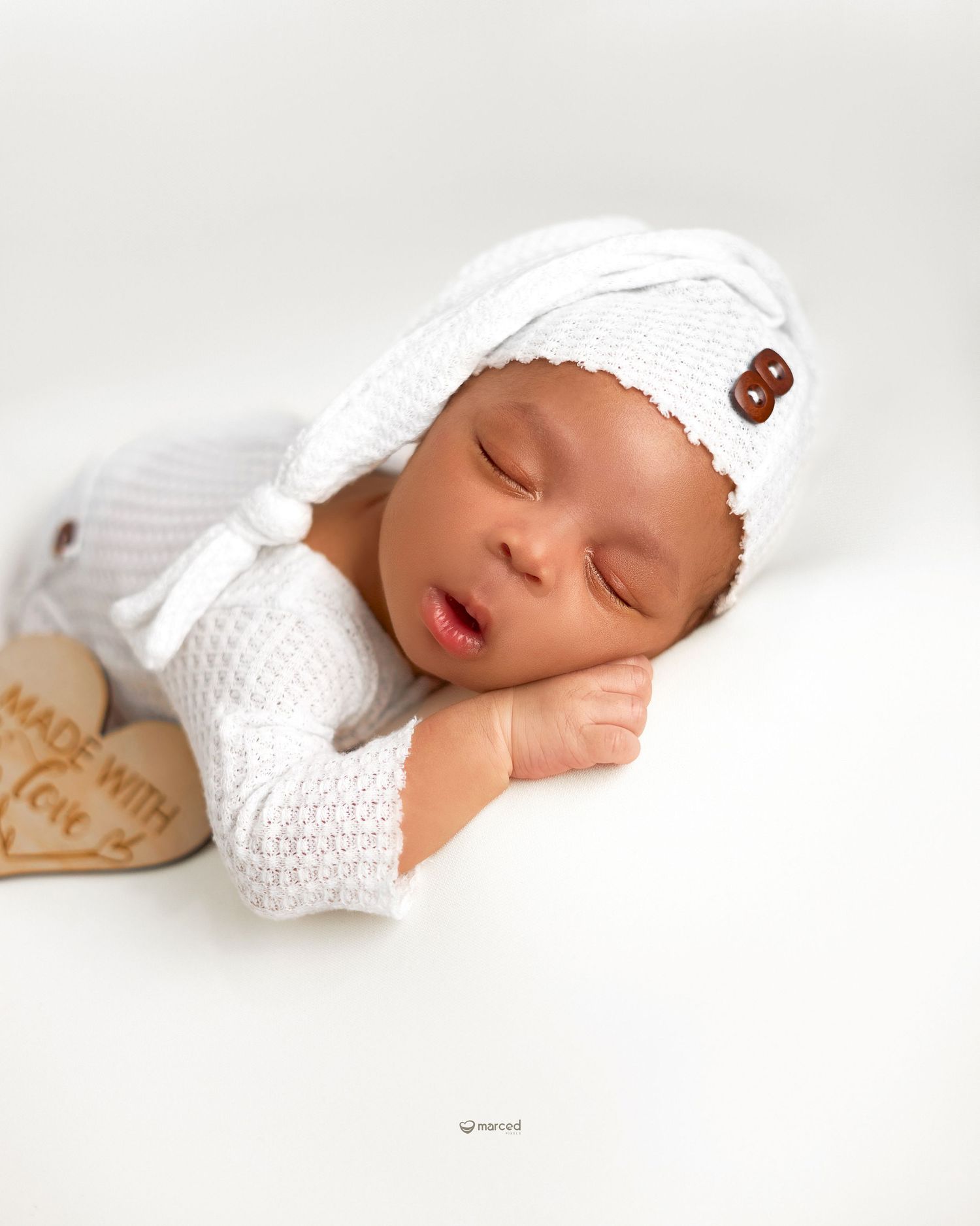 newborn photoshoot boy male white theme baby photoshoot made with love photography newborn poses