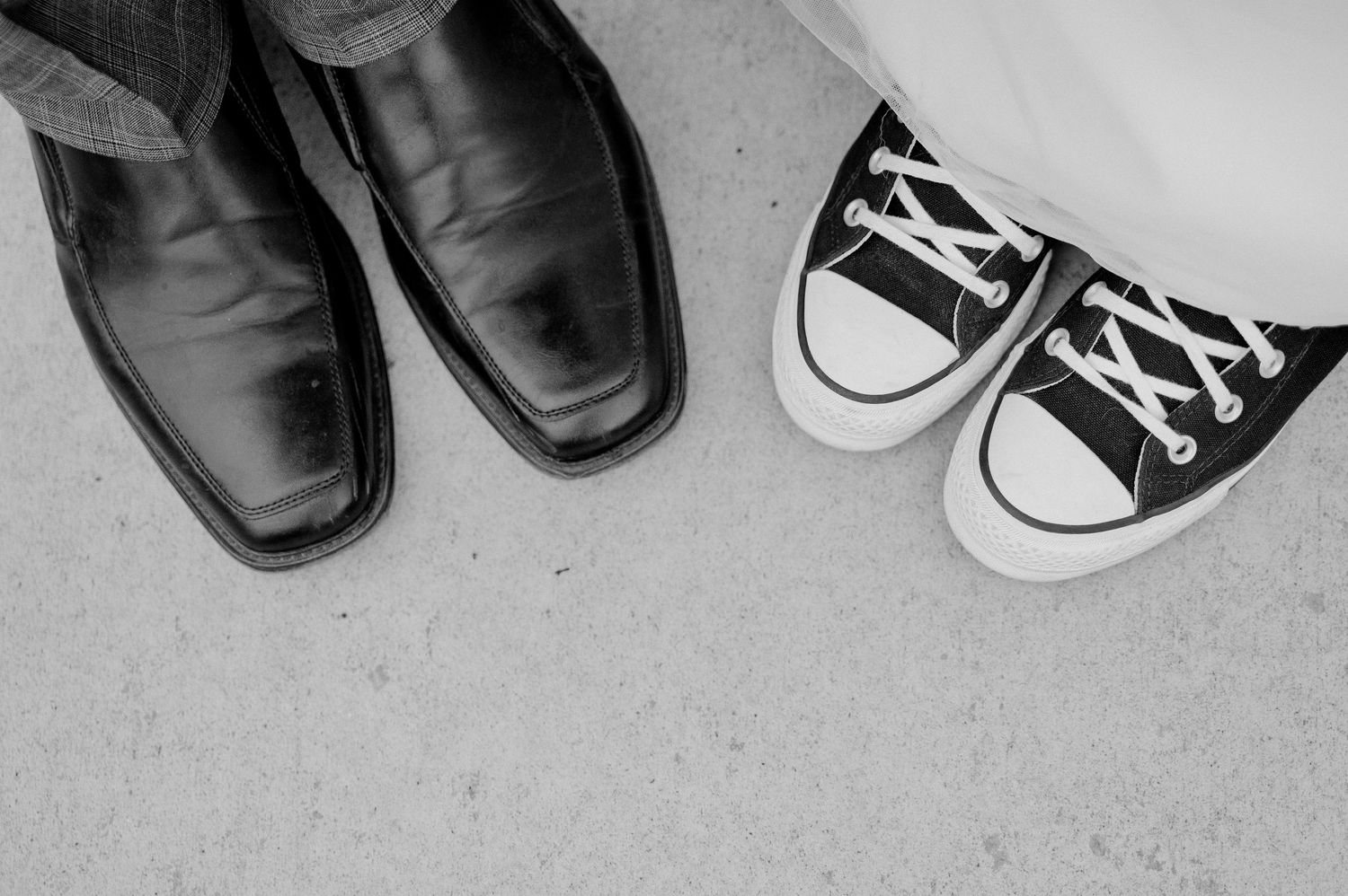 Shoes of the bride and groom at their wedding in Billings, Montana