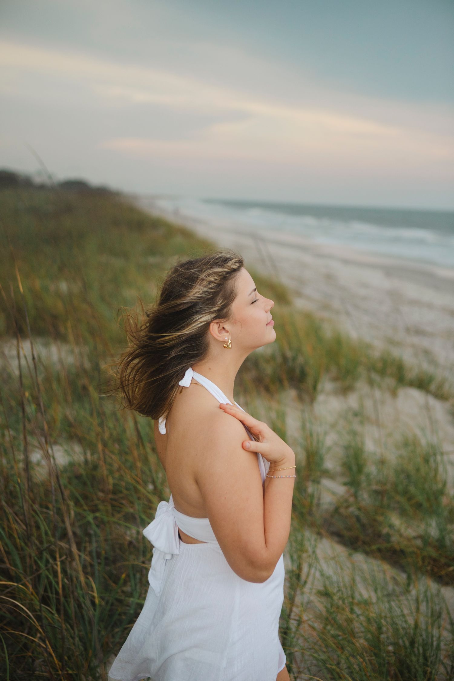 Senior Portrait class of 2025. Location Folly Field Hilton Head Island, SC. Ocean. Girl admiring the ocean view