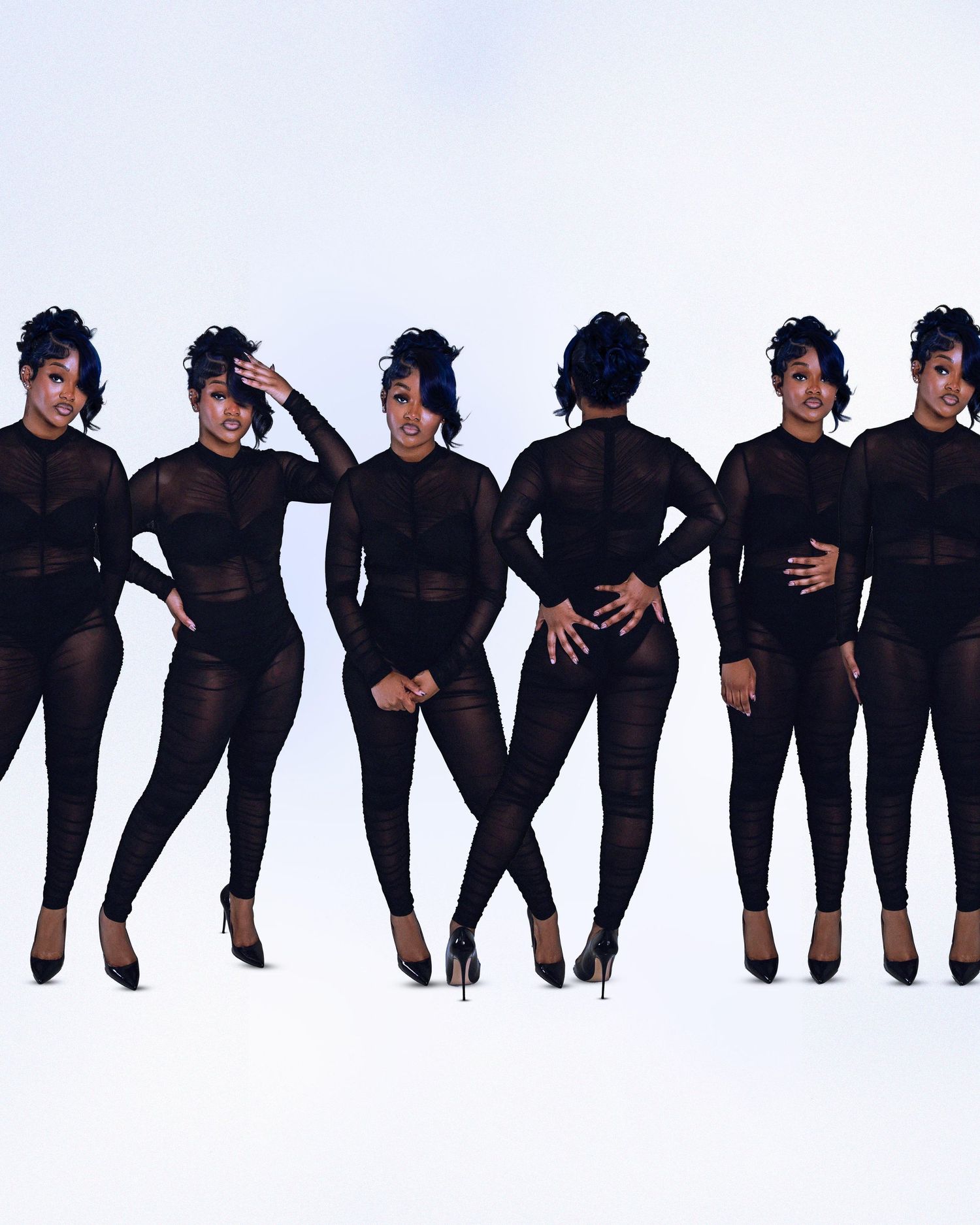 Six women in matching black mesh jumpsuits and heels pose together against white background.