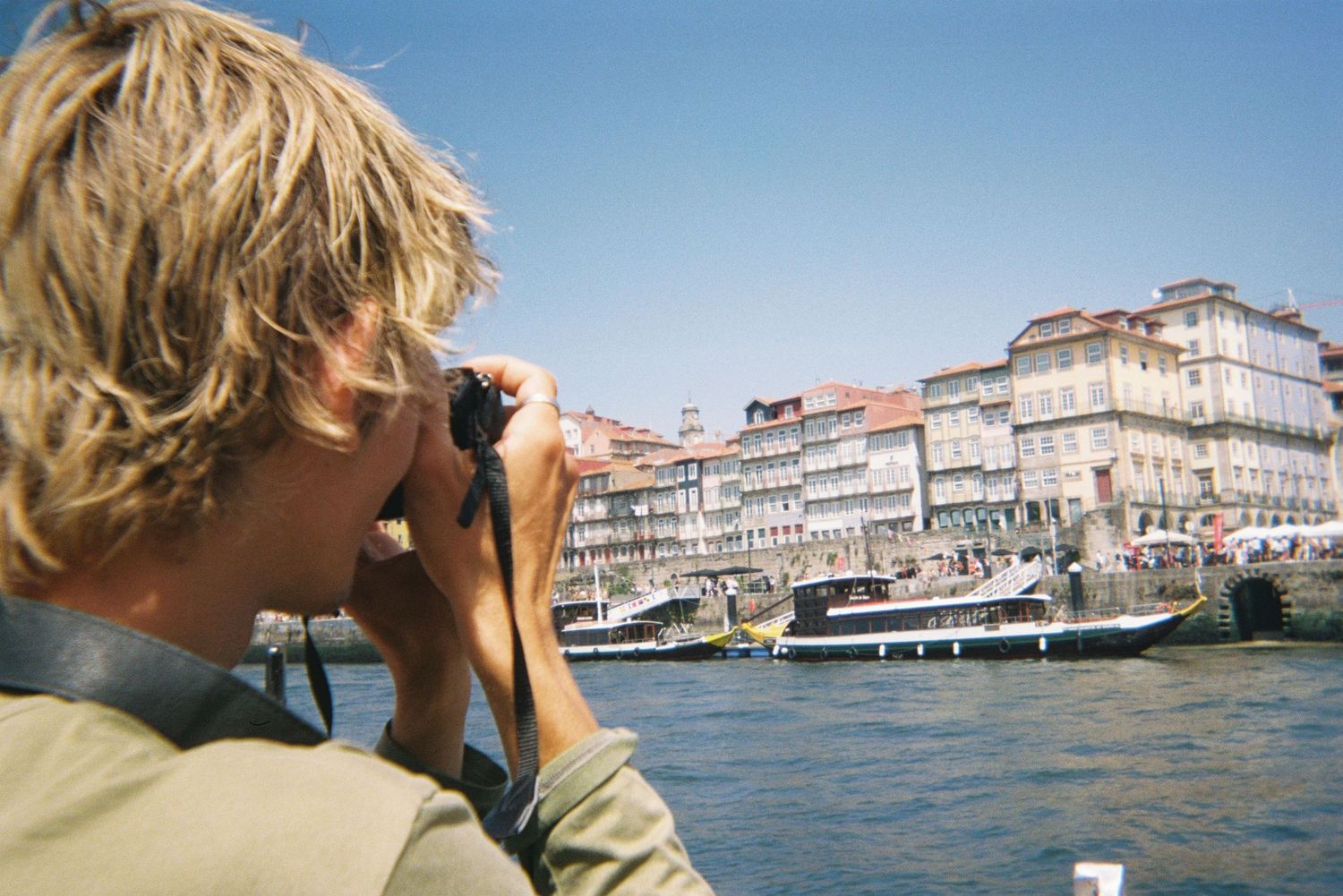 Ethan taking a photo of the city of Porto, in Portugal.
