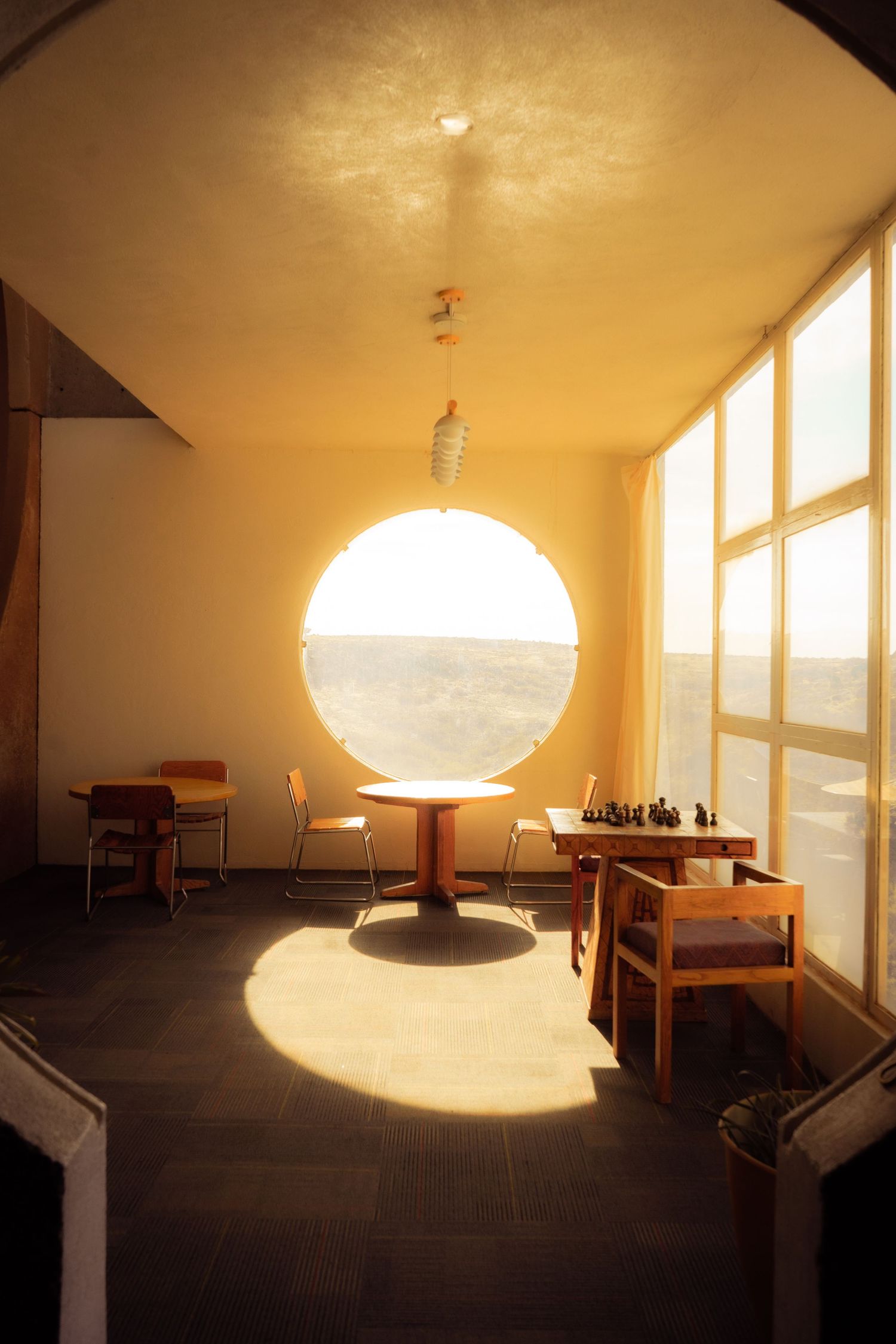 Large windows in the hotel let in natural light that warms the room up