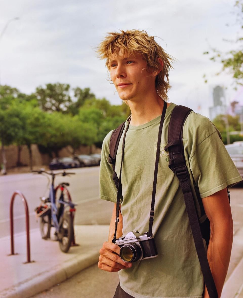 A person in an olive green t-shirt and black backpack is seen from various angles in a casual outdoor setting.