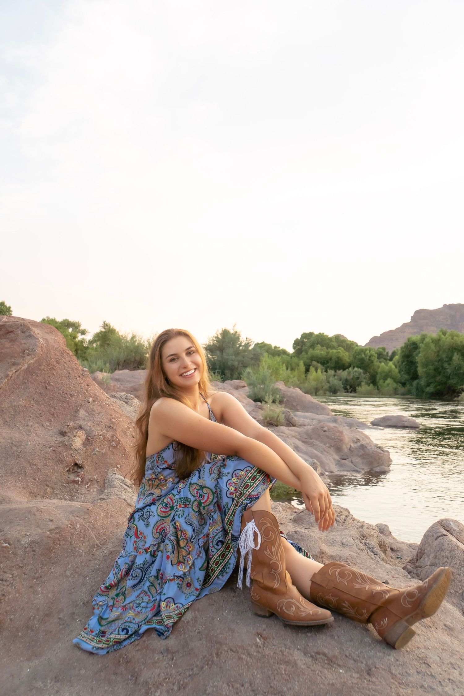 Senior portrait session at Salt River, Arizona, capturing authentic, natural moments with scenic desert and river landscapes