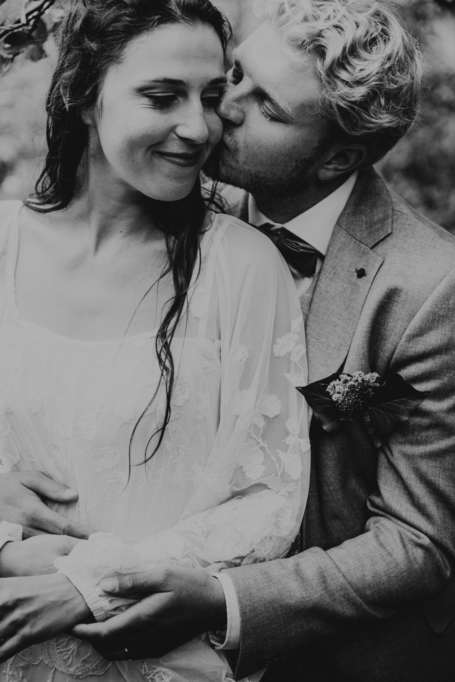 Black and white series of intimate moments between newlyweds in vintage-inspired setting.
