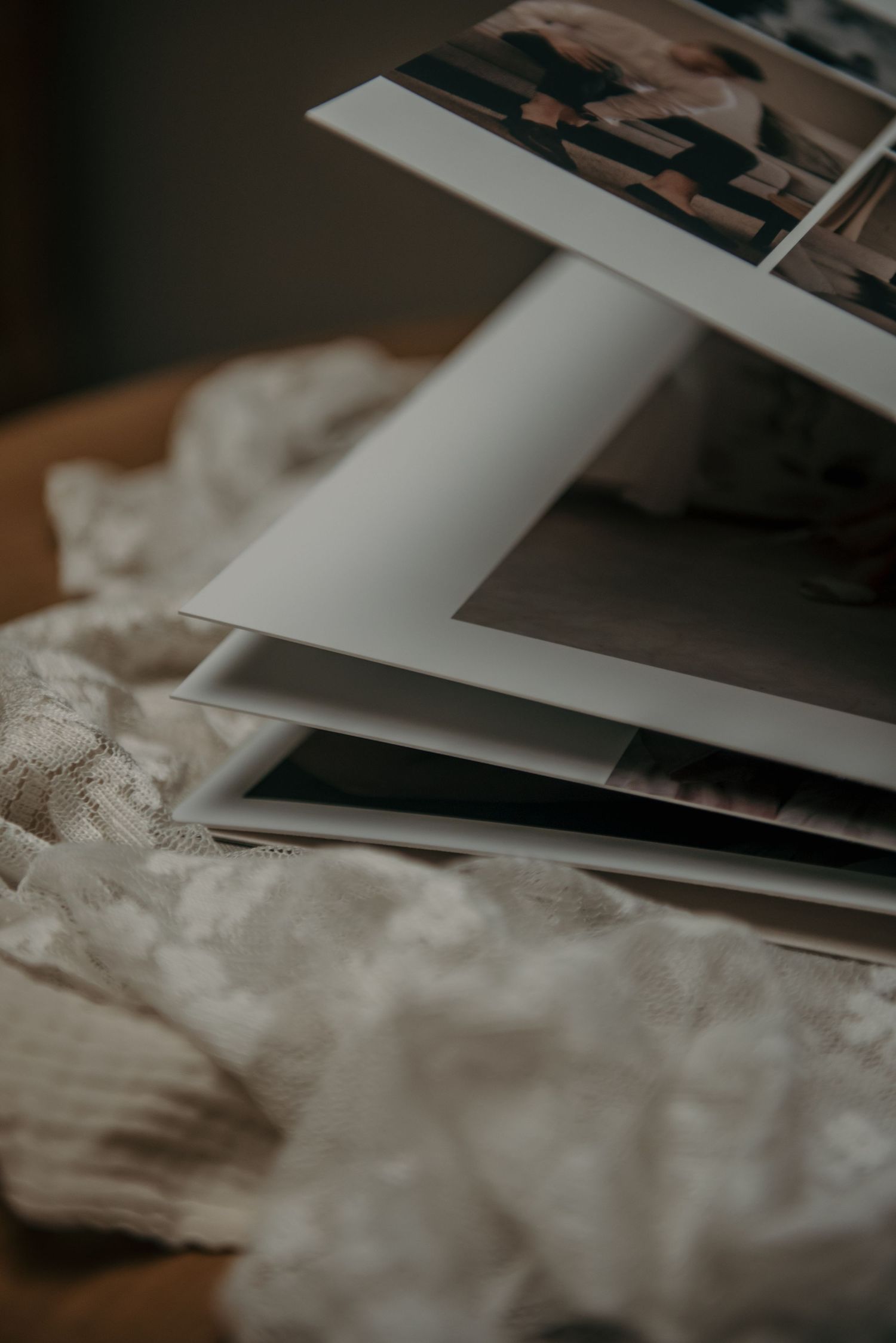 Artistic composition of layered photographs with soft shadows and edges.