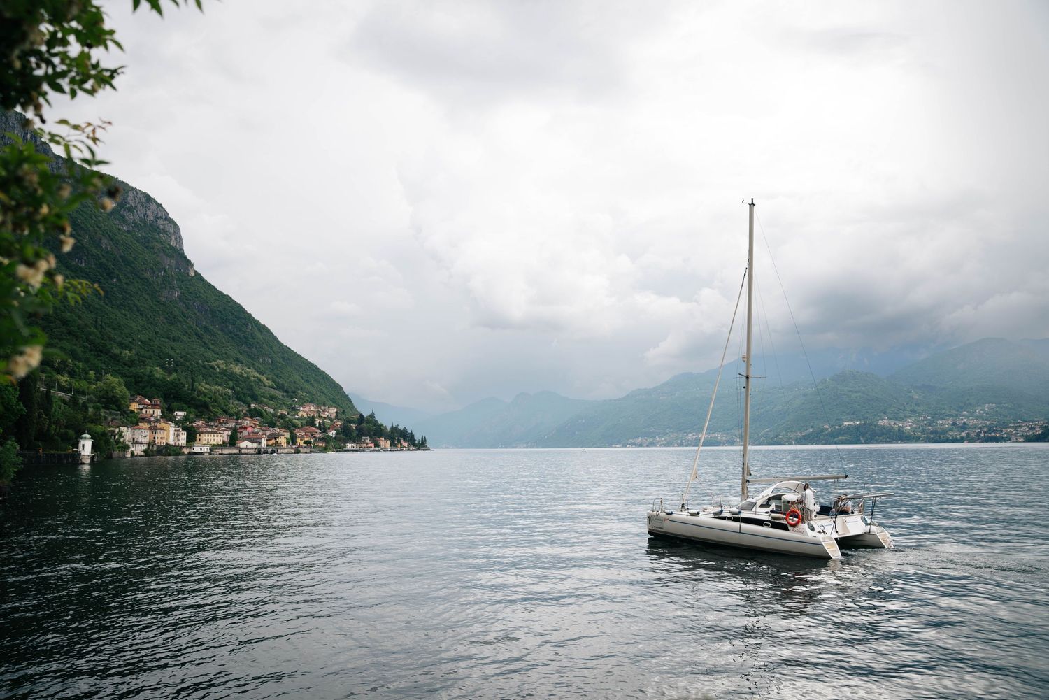boat sailing through lake Como, Italy