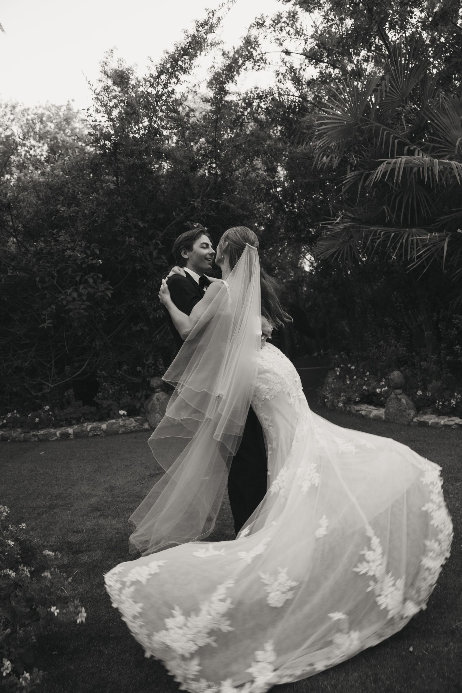 bride ad groom spinning for their couple photos at wedding in Fallbrook, CA