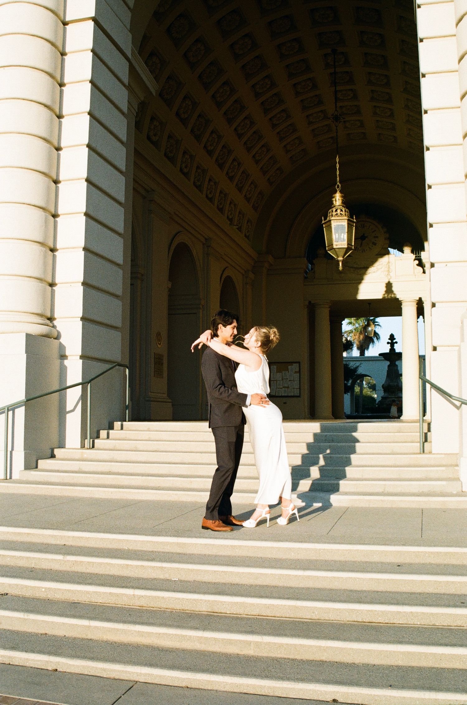 Couple in an editorial engagement shoot at Pasadena city hall