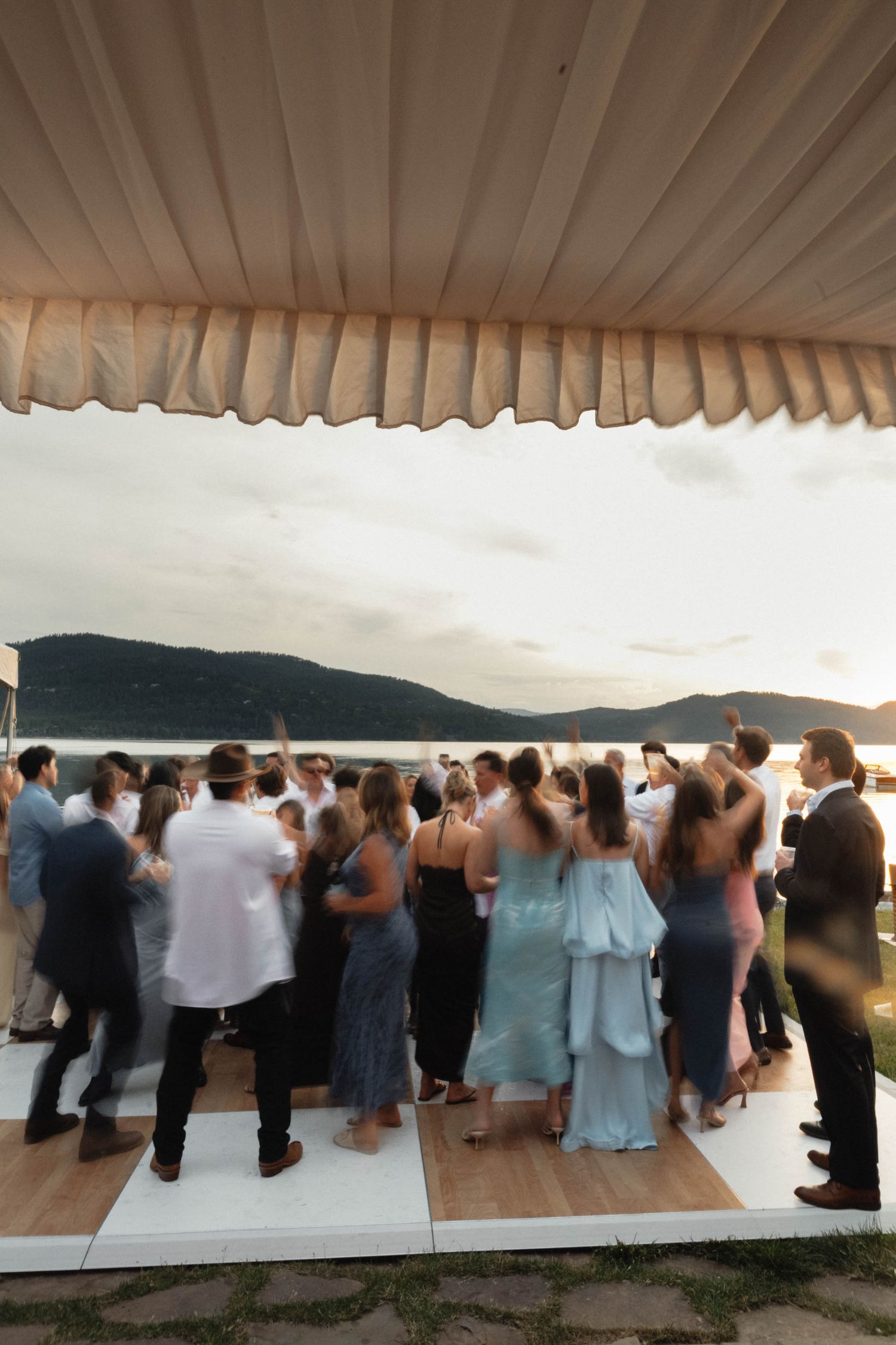 Wedding reception dance floor at sunset in Whitefish Montana