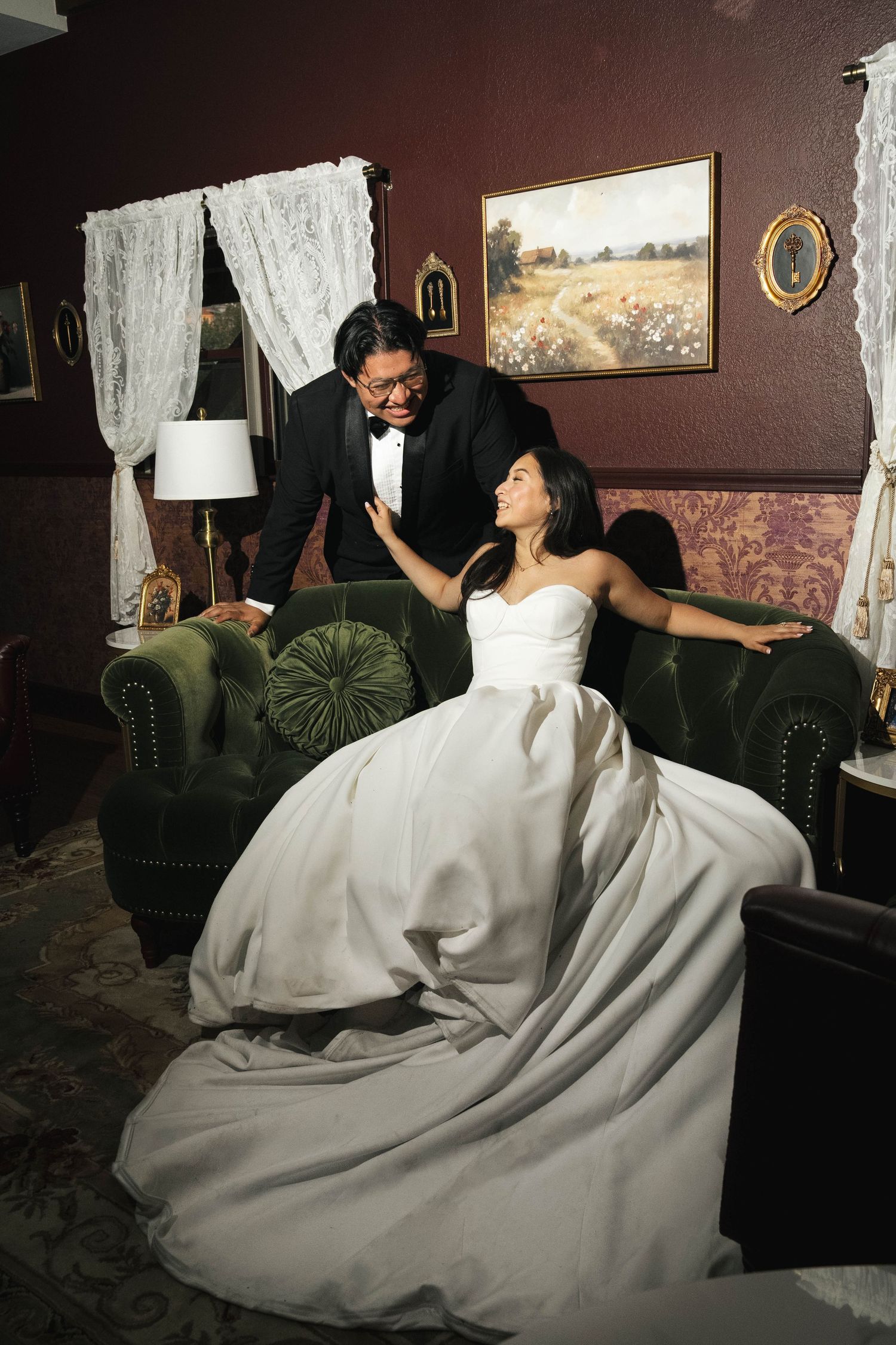 editorial flash photo of bride and groom on couch