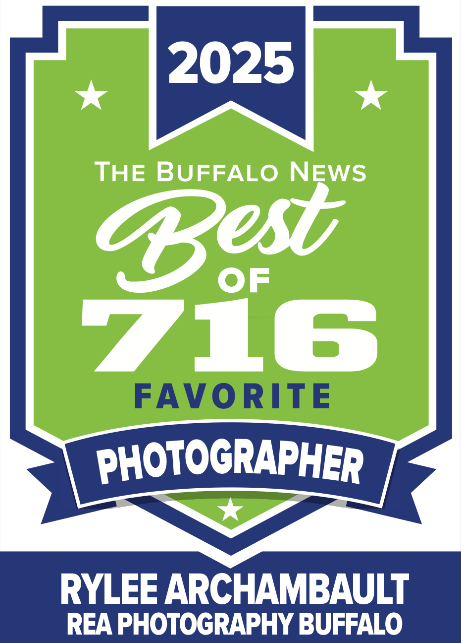 Collection of blue and green award badges for Best Photographer 2025.