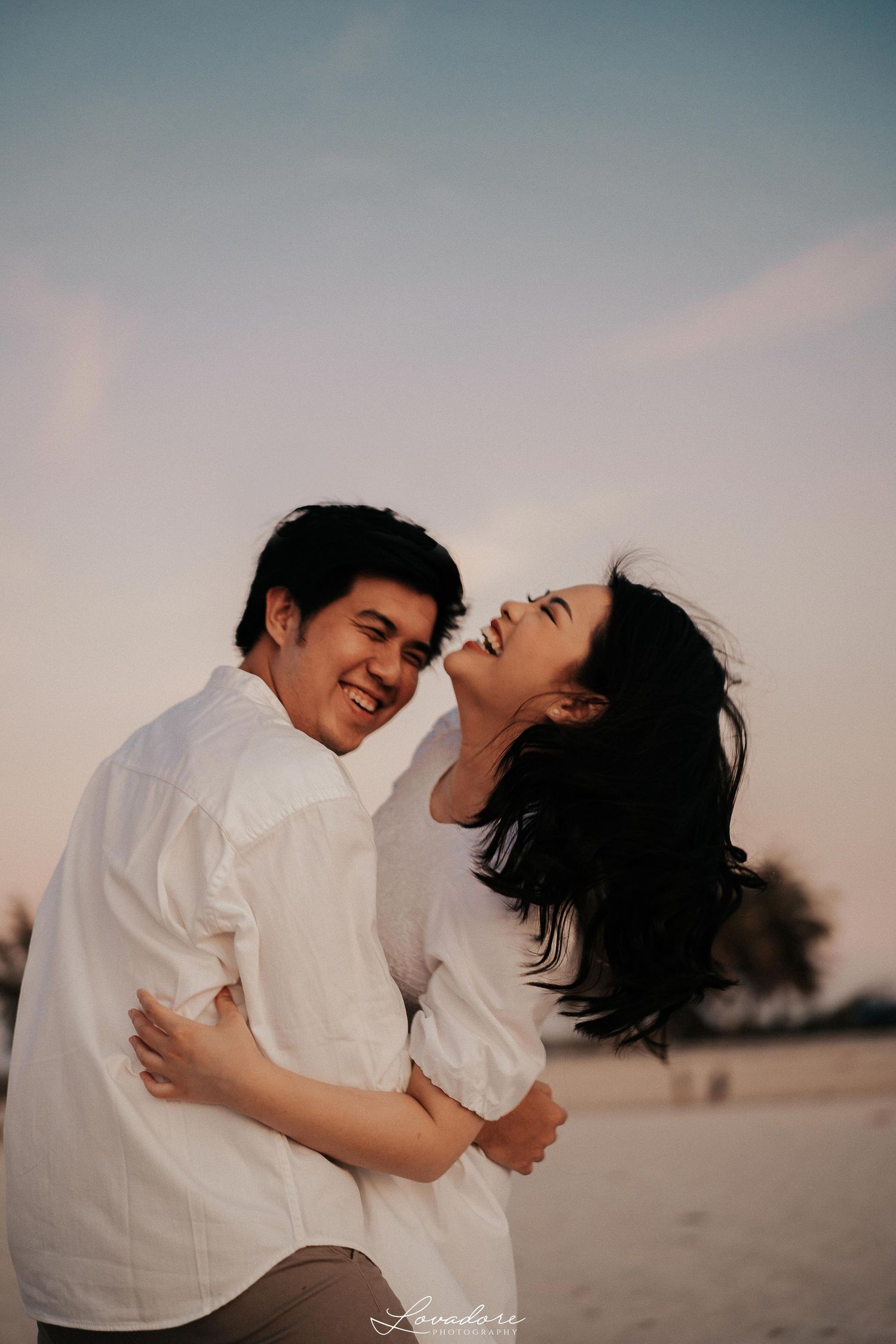 happy couple photoshoot with real emotion , by Lovadore. a photographer and videographer based in bali