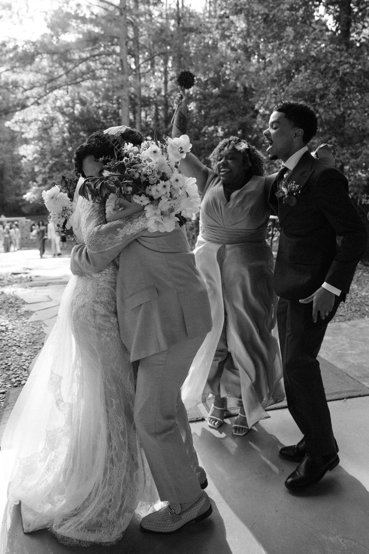 A sequence of four black and white photos showing couples dancing at a wedding celebration in an outdoor setting.