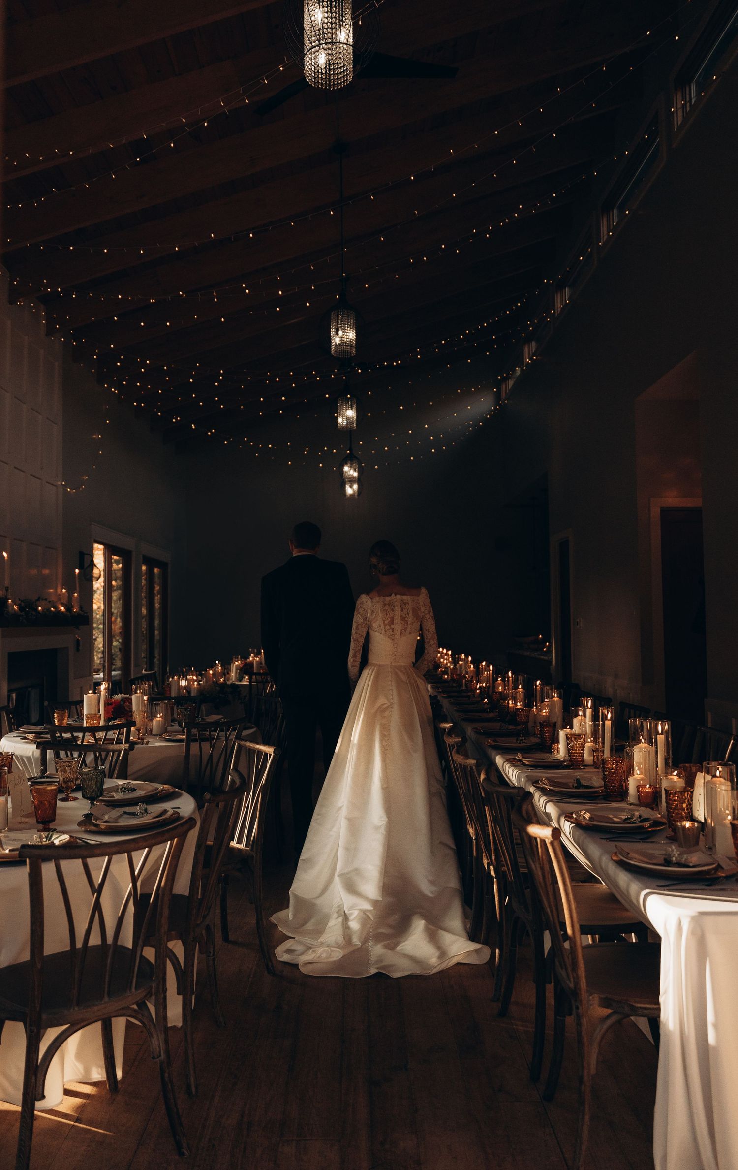 Candlelit wedding reception with warm, intimate lighting