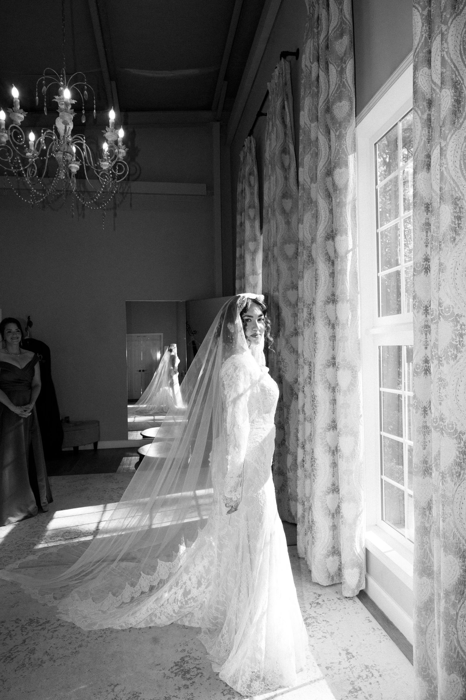 A series of elegant bridal portraits showing a flowing white wedding gown and veil in a sunlit room with floral curtains.