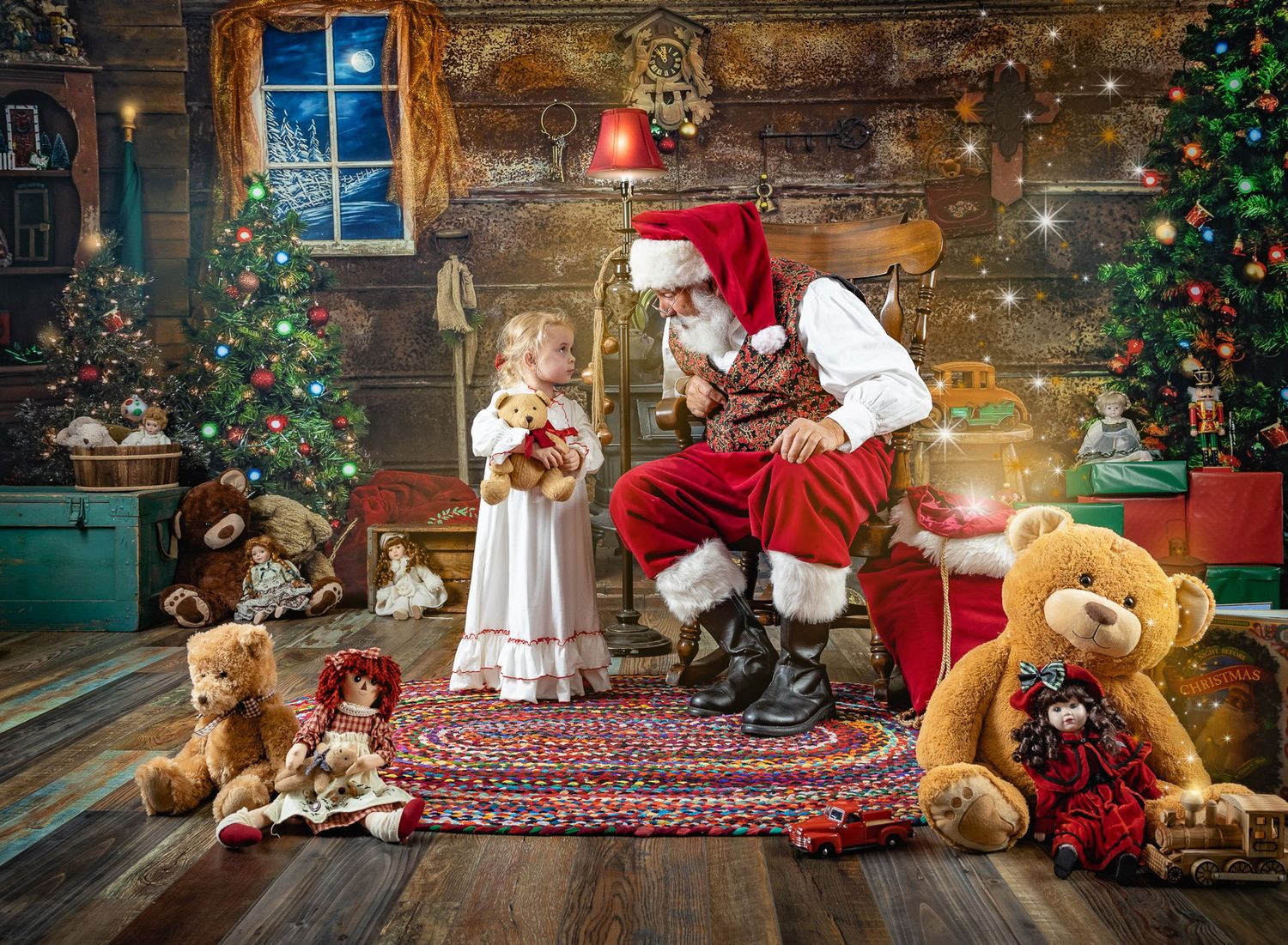Santa Claus kneels to greet a young girl surrounded by teddy bears and Christmas trees in a cozy decorated wooden room.