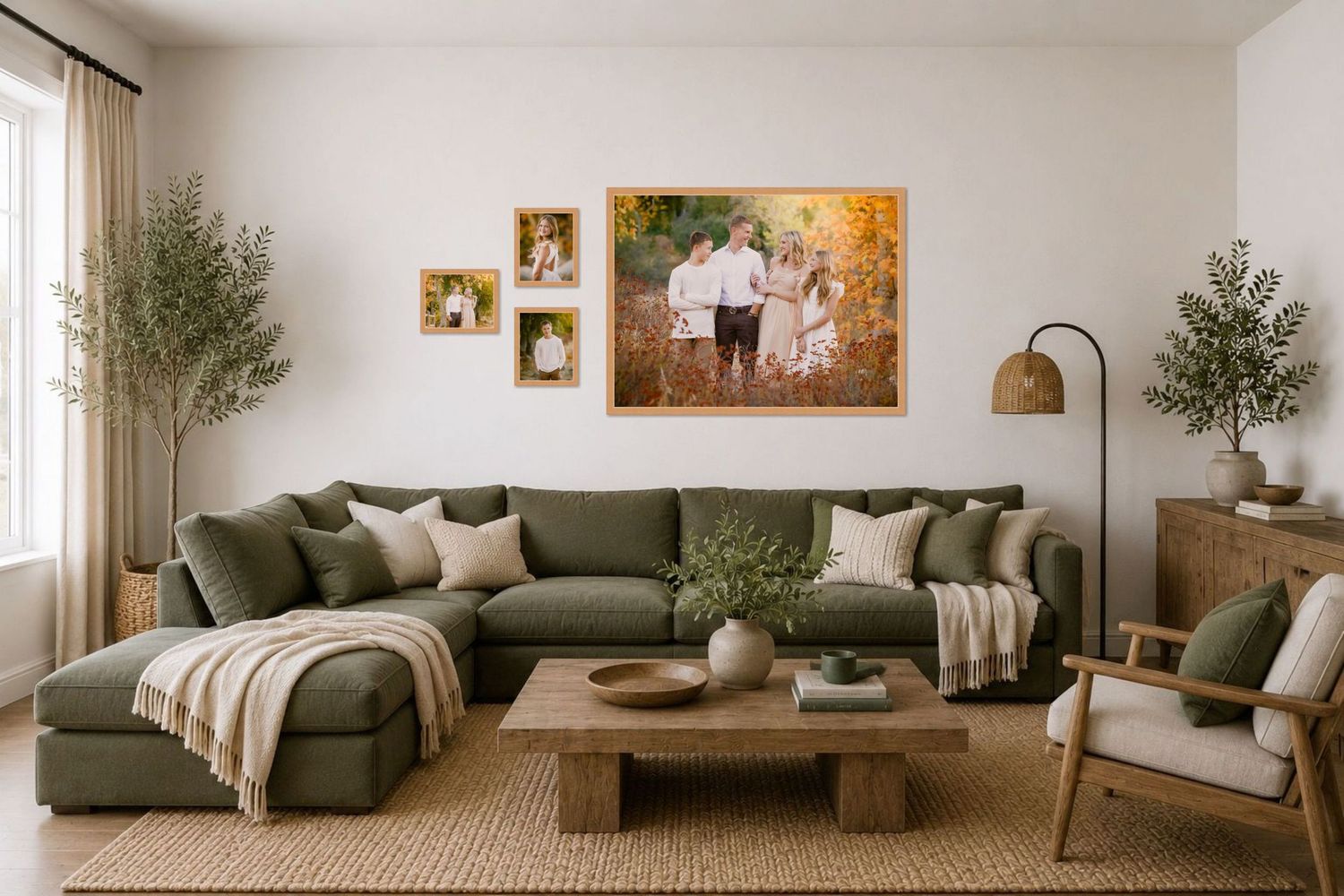 Cozy living room with green sectional sofa, wooden coffee table, and family portrait gallery wall in warm autumn tones.