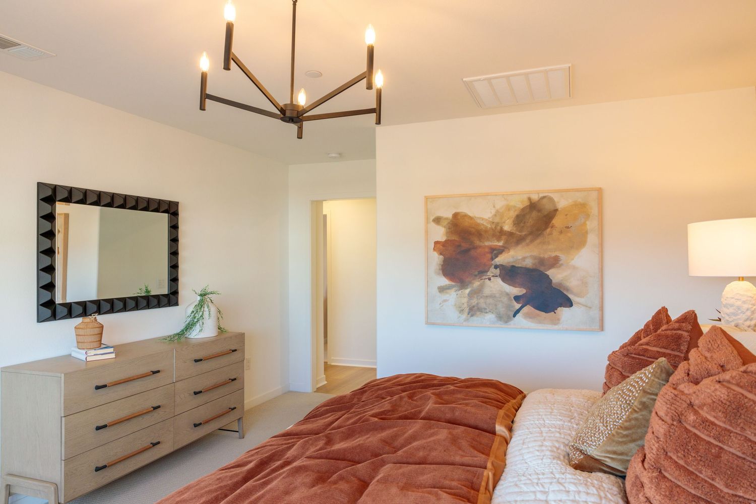 A collage of modern bedroom interior design photos showing furniture, lighting, and decor elements.