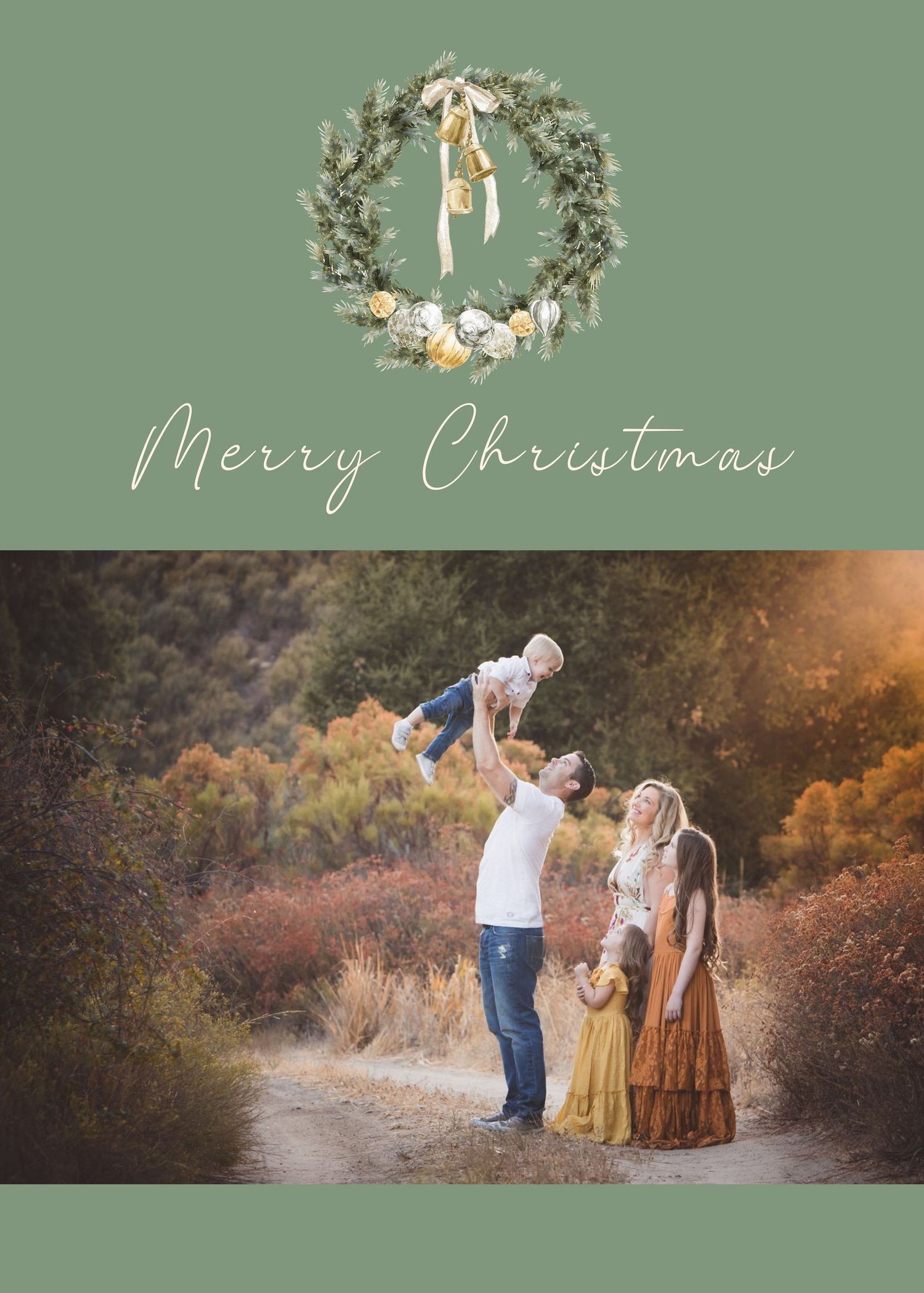 Family wearing coordinating outfits poses together on a nature path during golden hour for holiday photos.