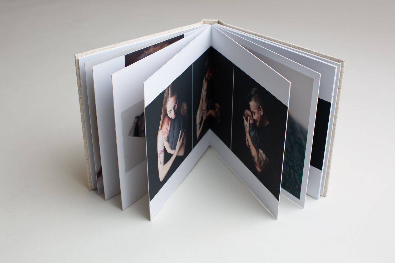 Photo album with multiple spread pages displaying portrait photographs. Temecula - Murrieta - Menifee - Corona Photographer