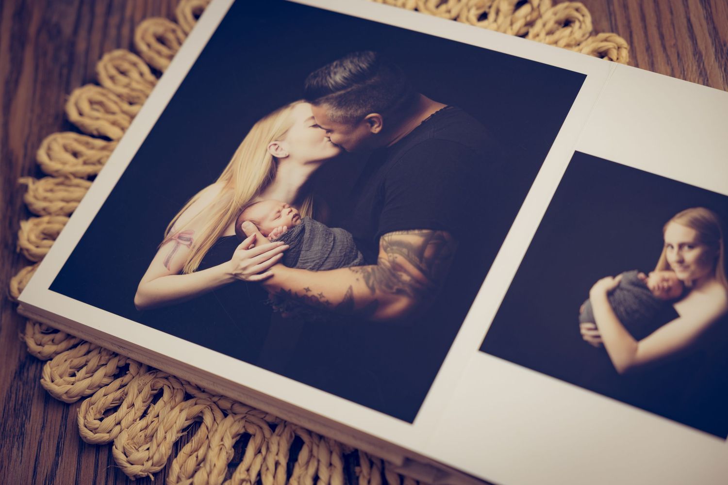 A row of printed photographs arranged on a wooden surface showing similar artistic portrait compositions.