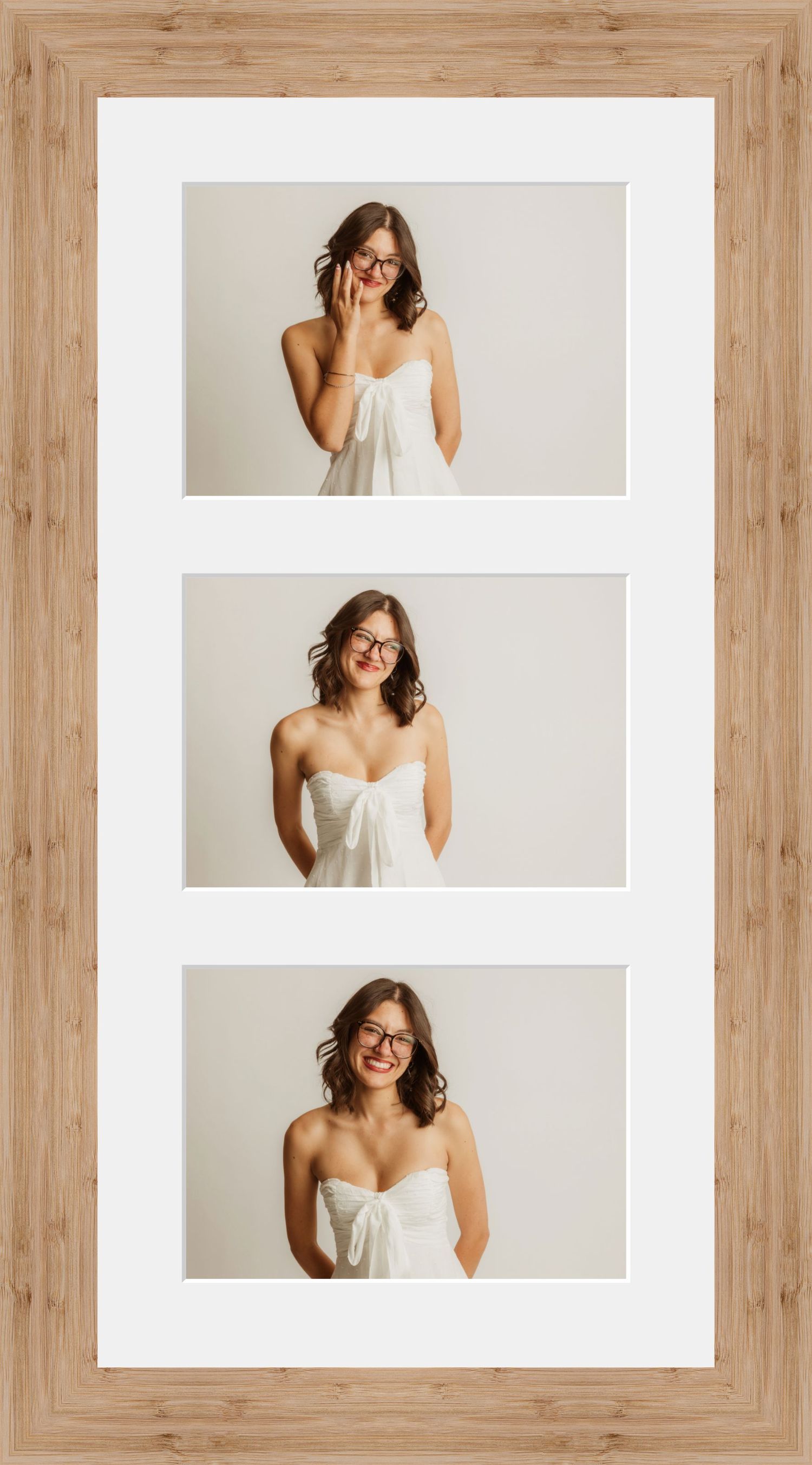 A triptych of a young brunette woman in a white strapless dress, wearing glasses, posing in a wooden photo frame.