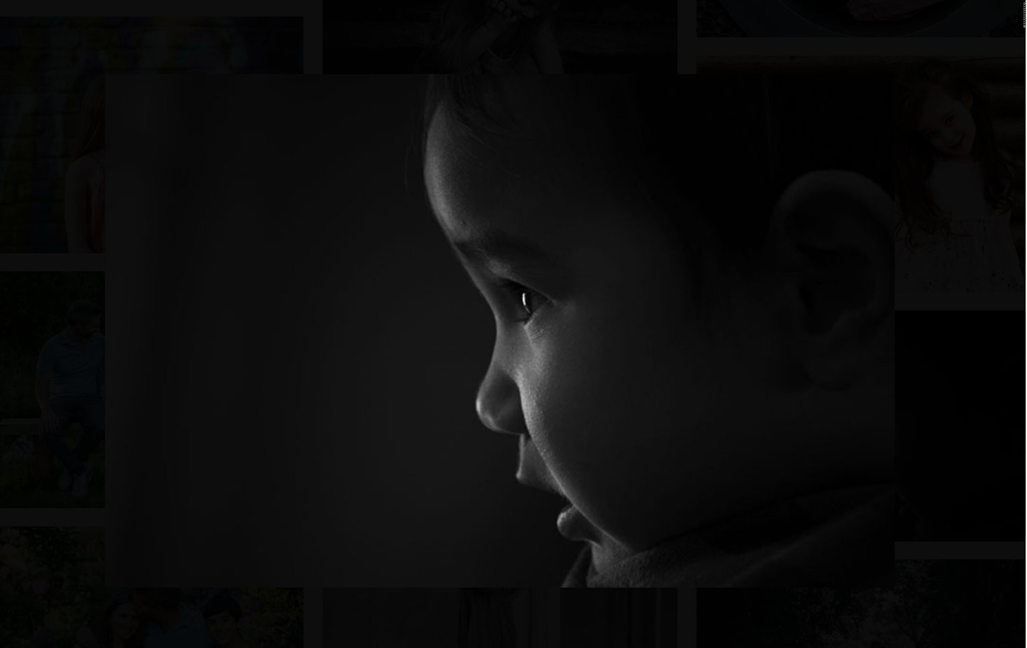 Beautiful black and white portrait of a young boy during a family portrait session in Whitefield, Manchester