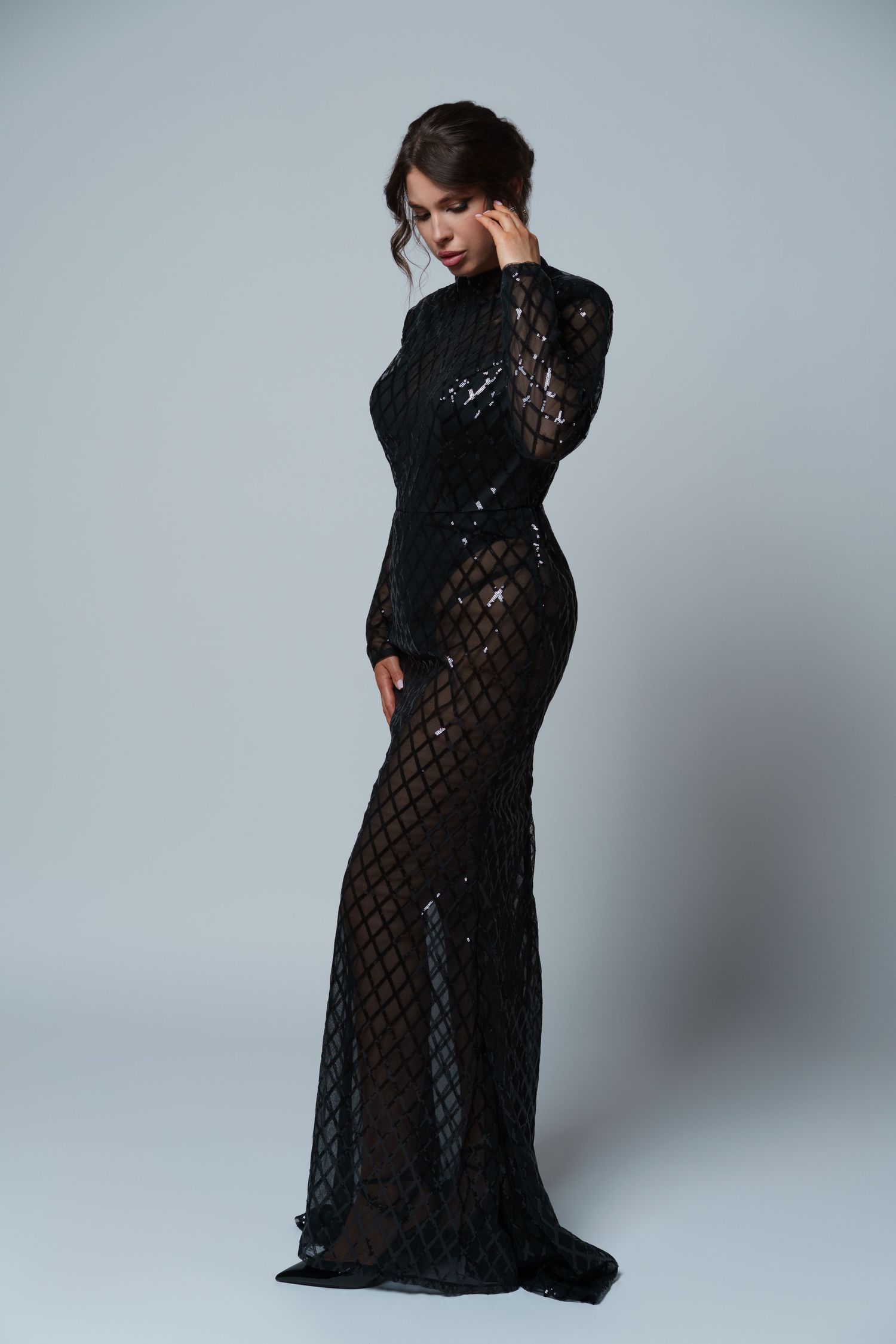 Elegant brunette posing for her birthday photoshoot in a black sequin gown — graceful and refined studio portrait in Chicago.