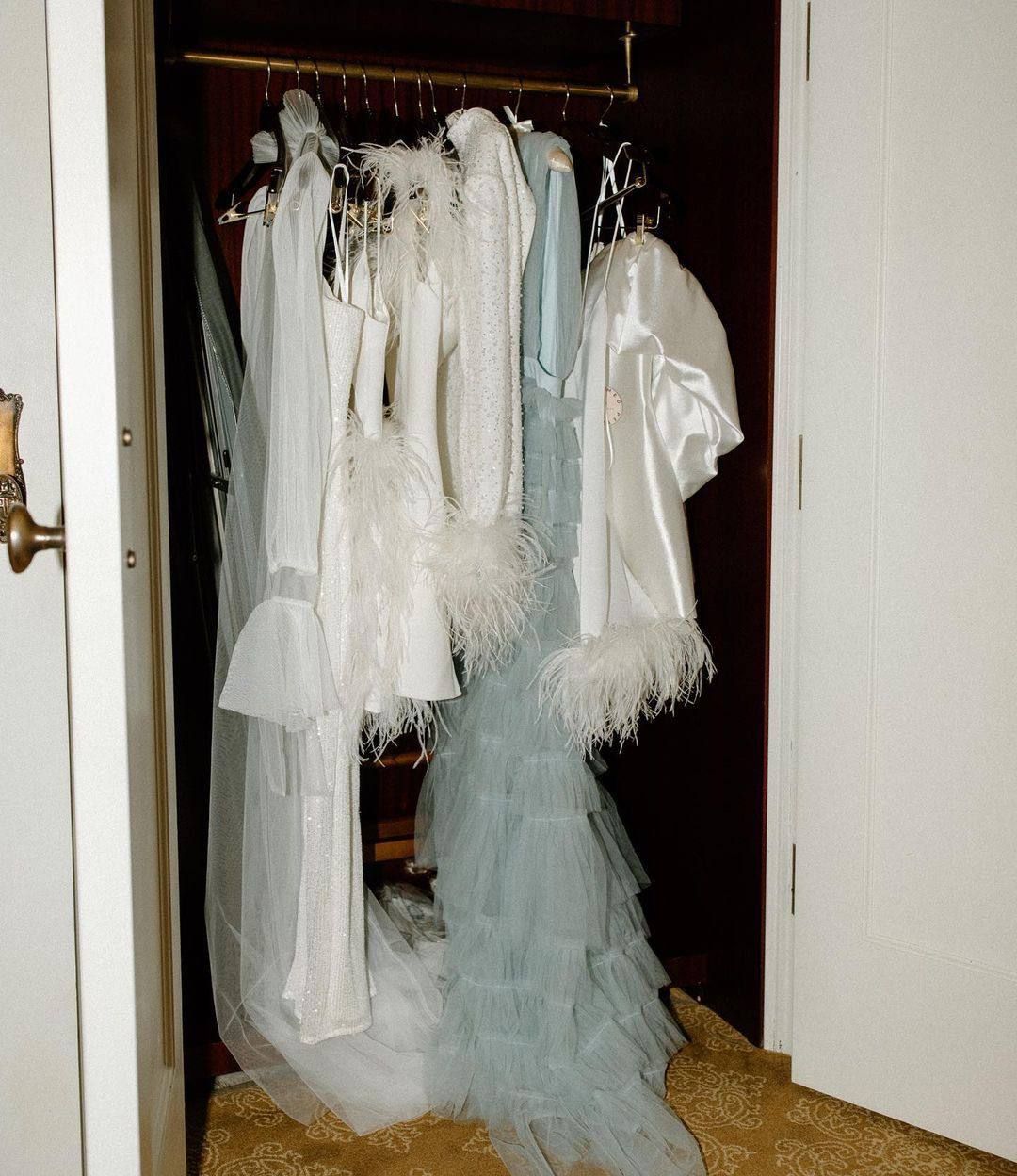 Couture wardrobe of luxury maternity gowns in photo studio in Chicago.