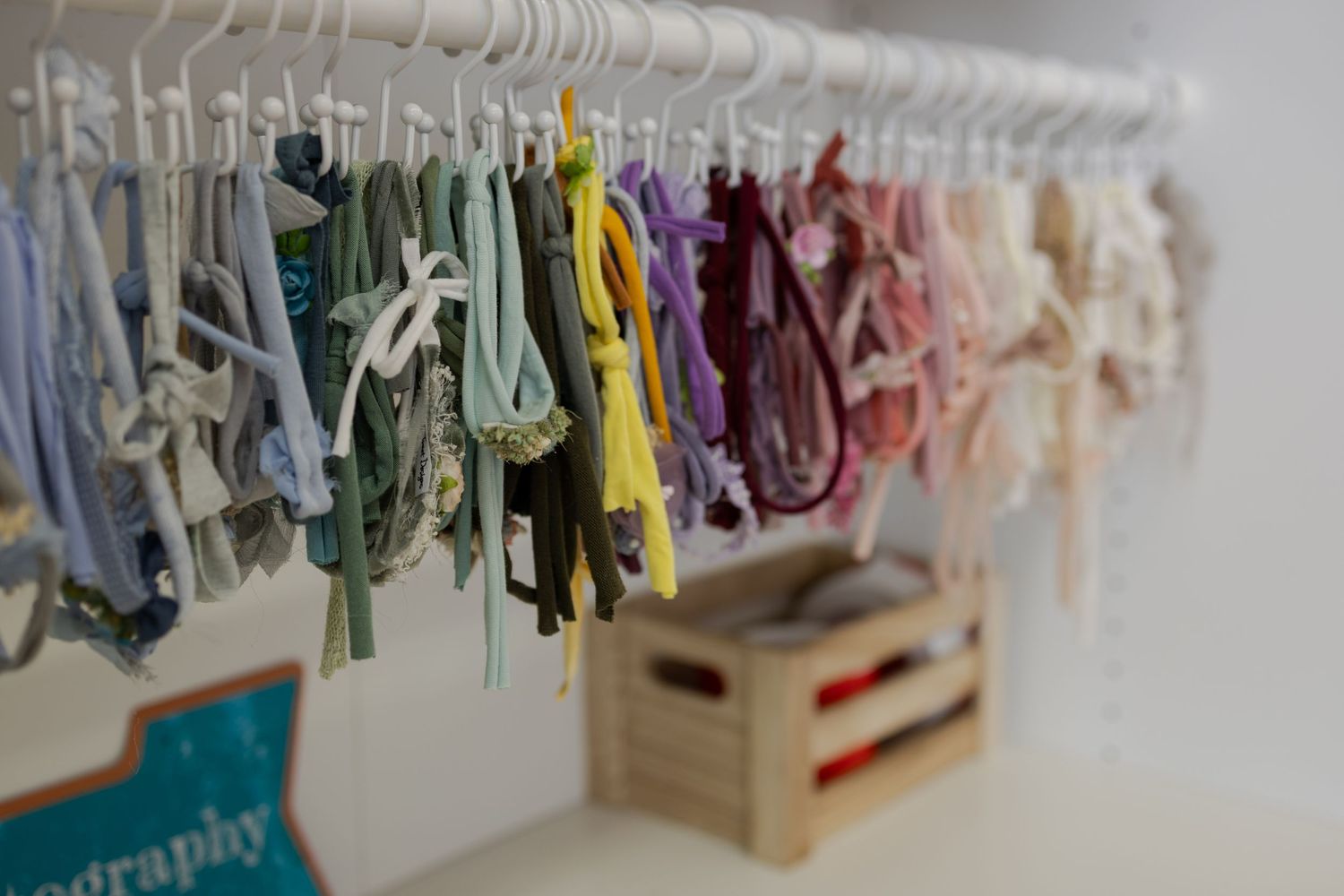 Colorful newborn wraps and accessories available for newborn photography sessions at the TLP studio