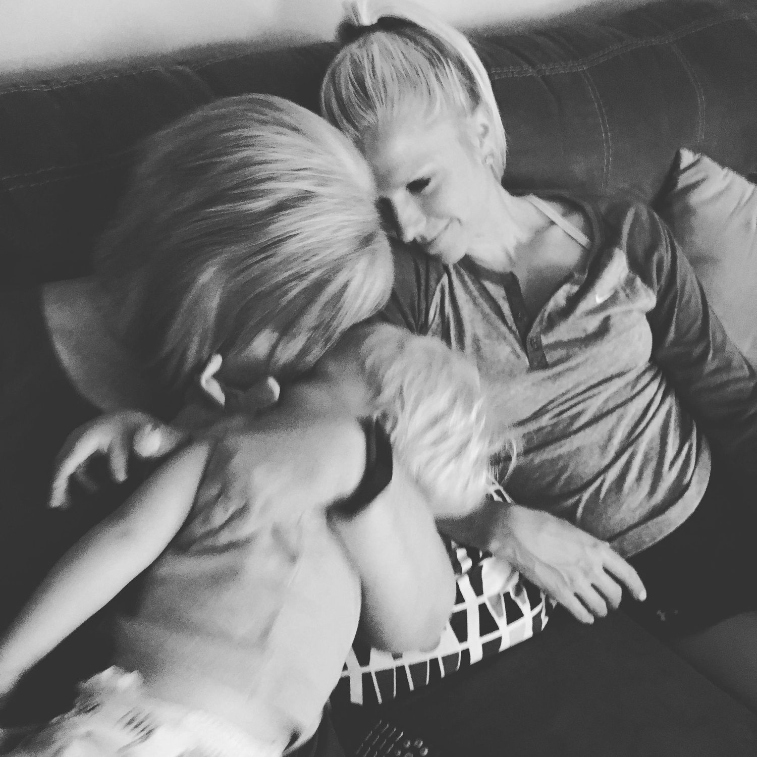 Nine black and white photos show an artistic photo sequence of an intimate embrace captured in a storytelling style.