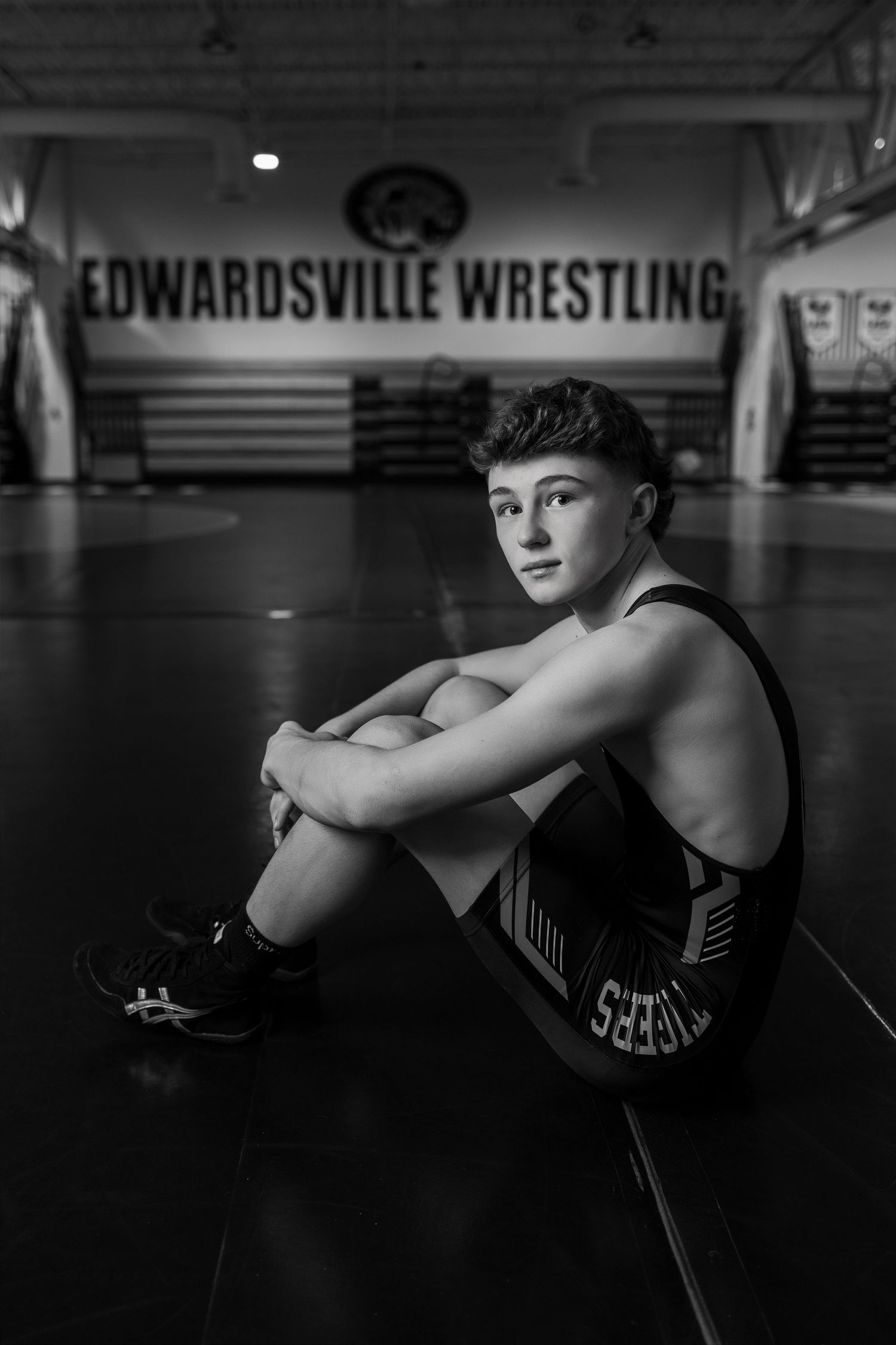 A series of black and white photos showing wrestling training moves and techniques at Edwardsville Wrestling.