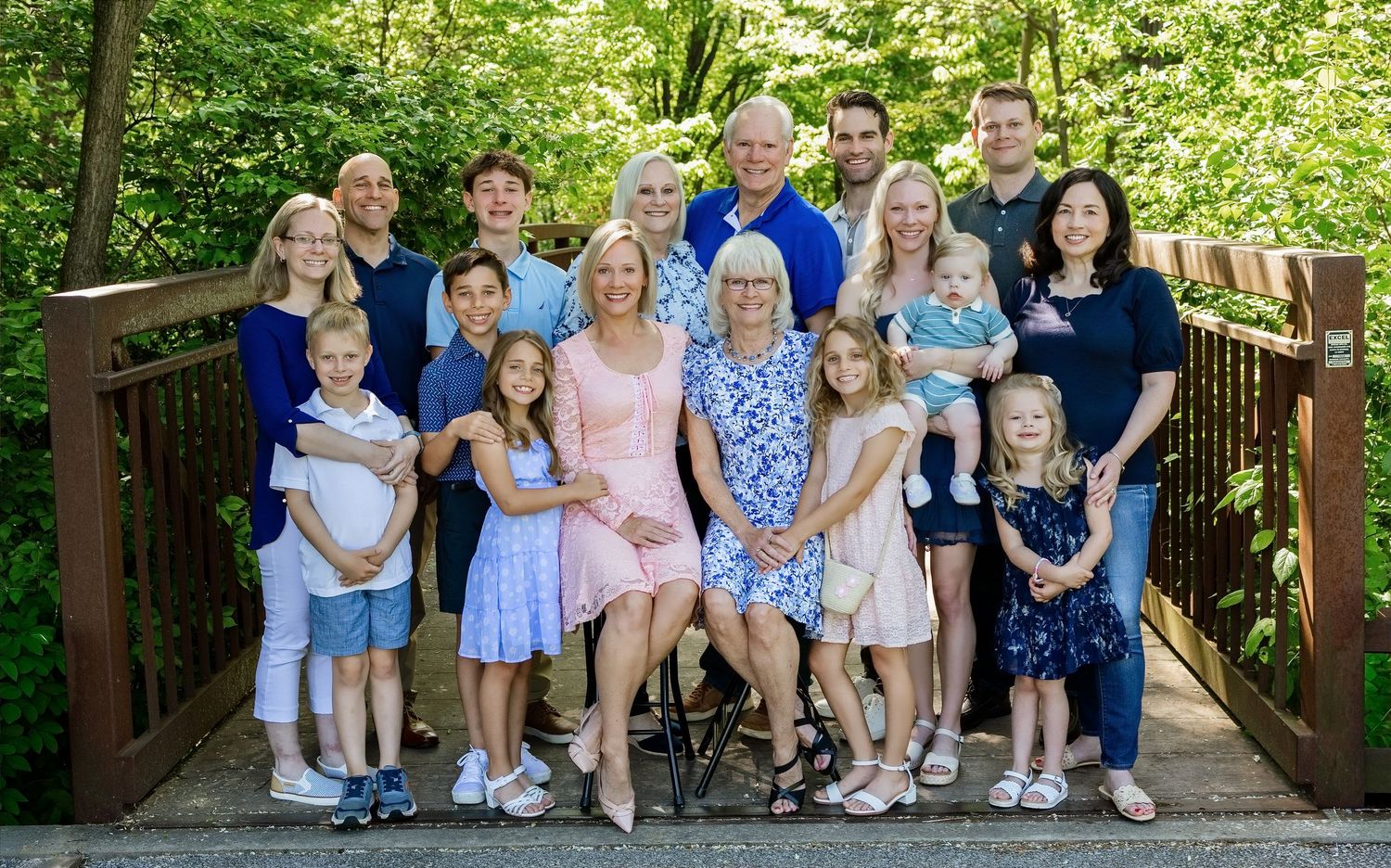 Multigenerational family posing together during an outdoor extended-family photography session in the Metro East area